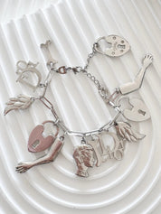 Vintage Christian Dior Silver Tone Logo Bracelet Vintage Multi-Charms Heart Lock John Galliano time, Statement bracelet, Vintage Jewelry