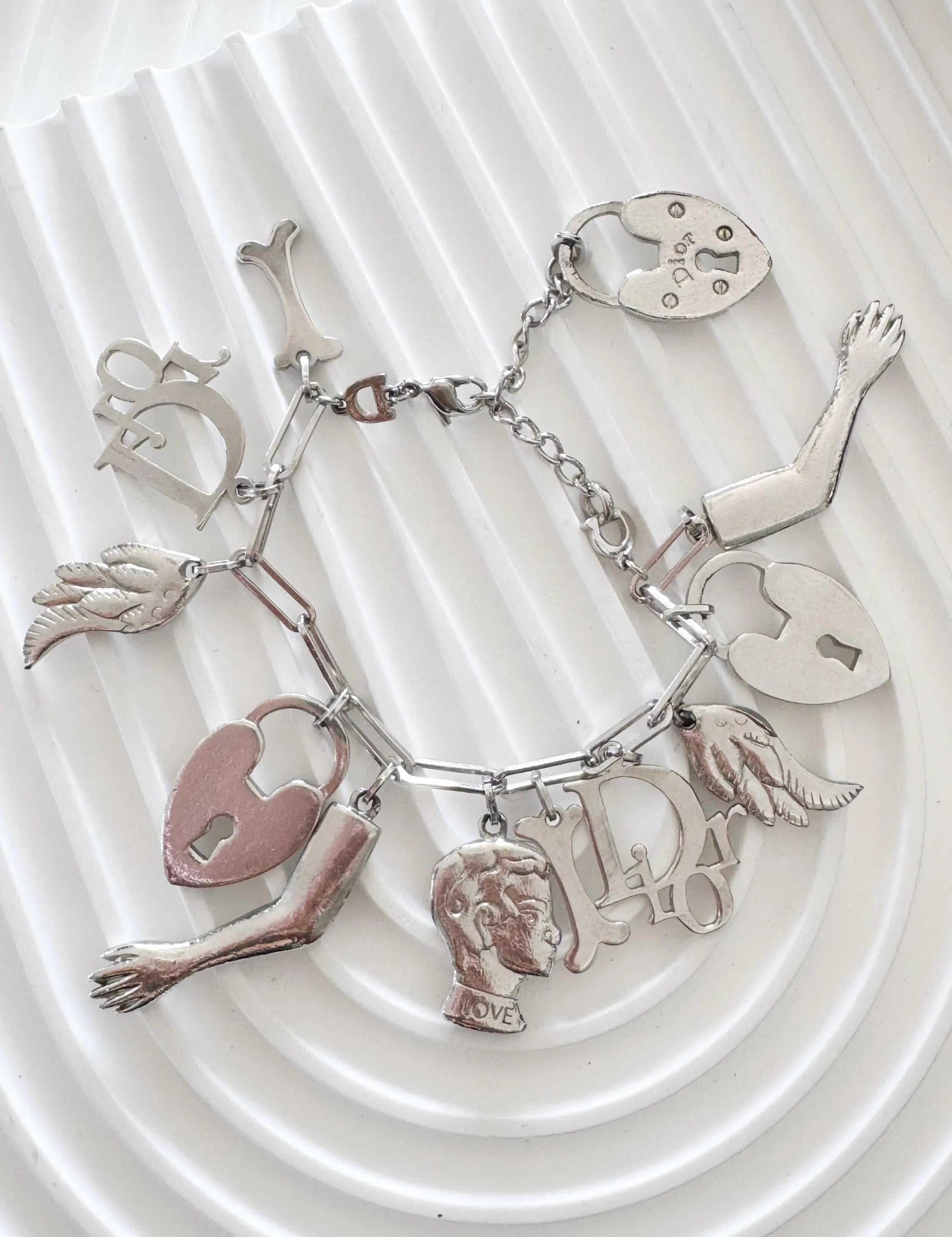 Vintage Christian Dior Silver Tone Logo Bracelet Vintage Multi-Charms Heart Lock John Galliano time, Statement bracelet, Vintage Jewelry