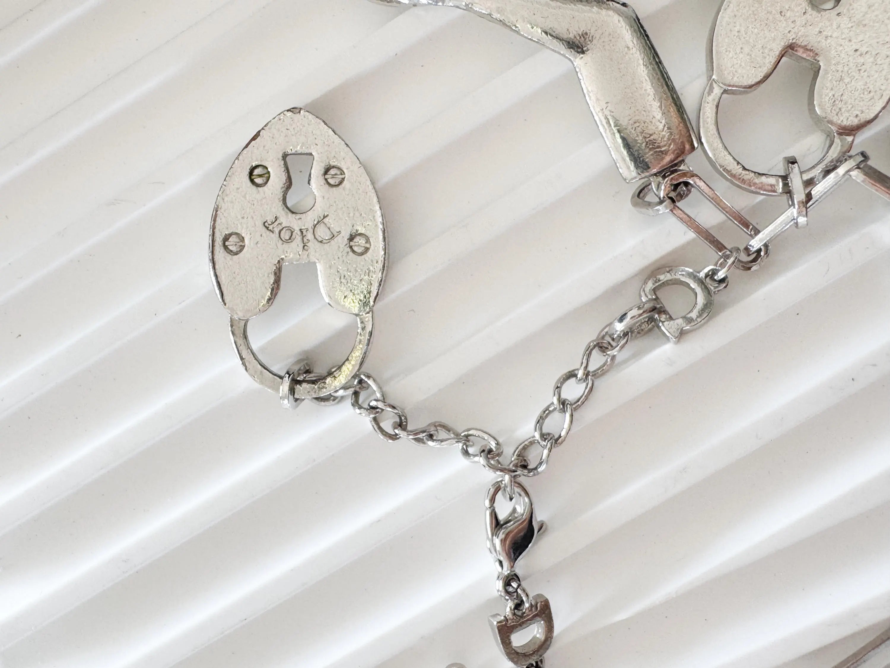 Vintage Christian Dior Silver Tone Logo Bracelet Vintage Multi-Charms Heart Lock John Galliano time, Statement bracelet, Vintage Jewelry