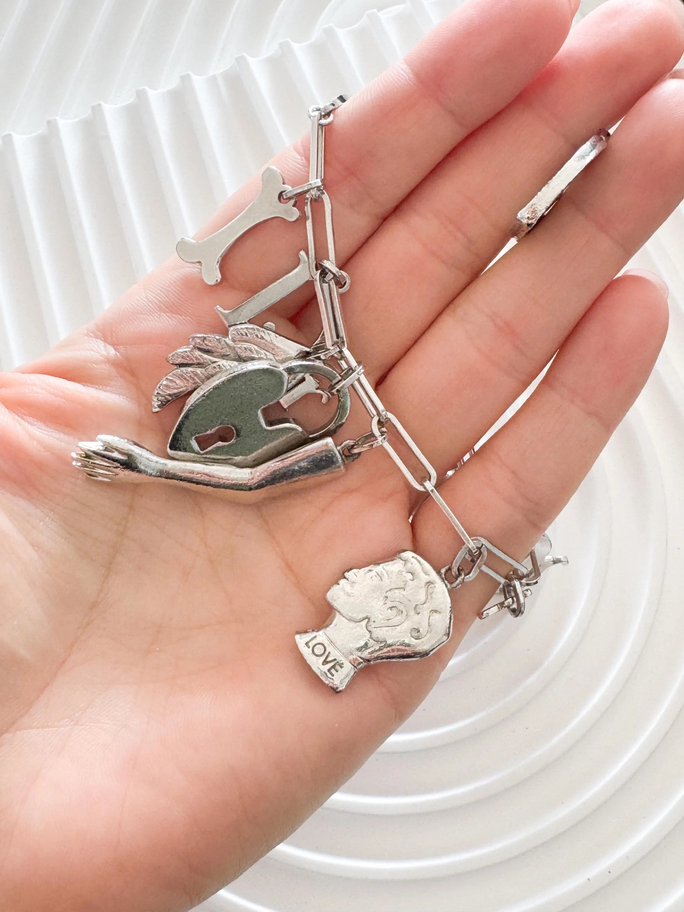 Vintage Christian Dior Silver Tone Logo Bracelet Vintage Multi-Charms Heart Lock John Galliano time, Statement bracelet, Vintage Jewelry