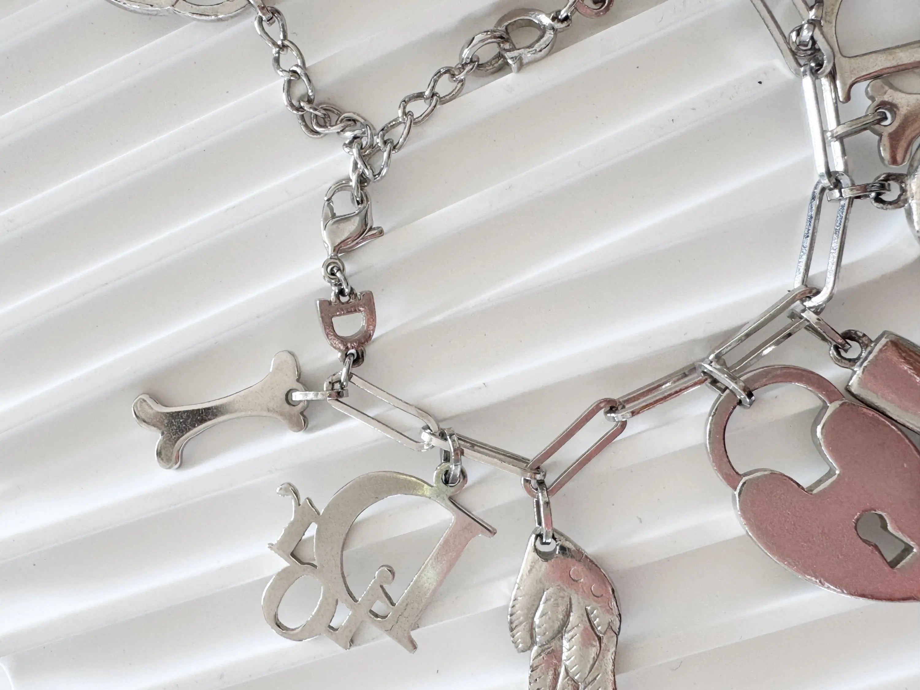 Vintage Christian Dior Silver Tone Logo Bracelet Vintage Multi-Charms Heart Lock John Galliano time, Statement bracelet, Vintage Jewelry