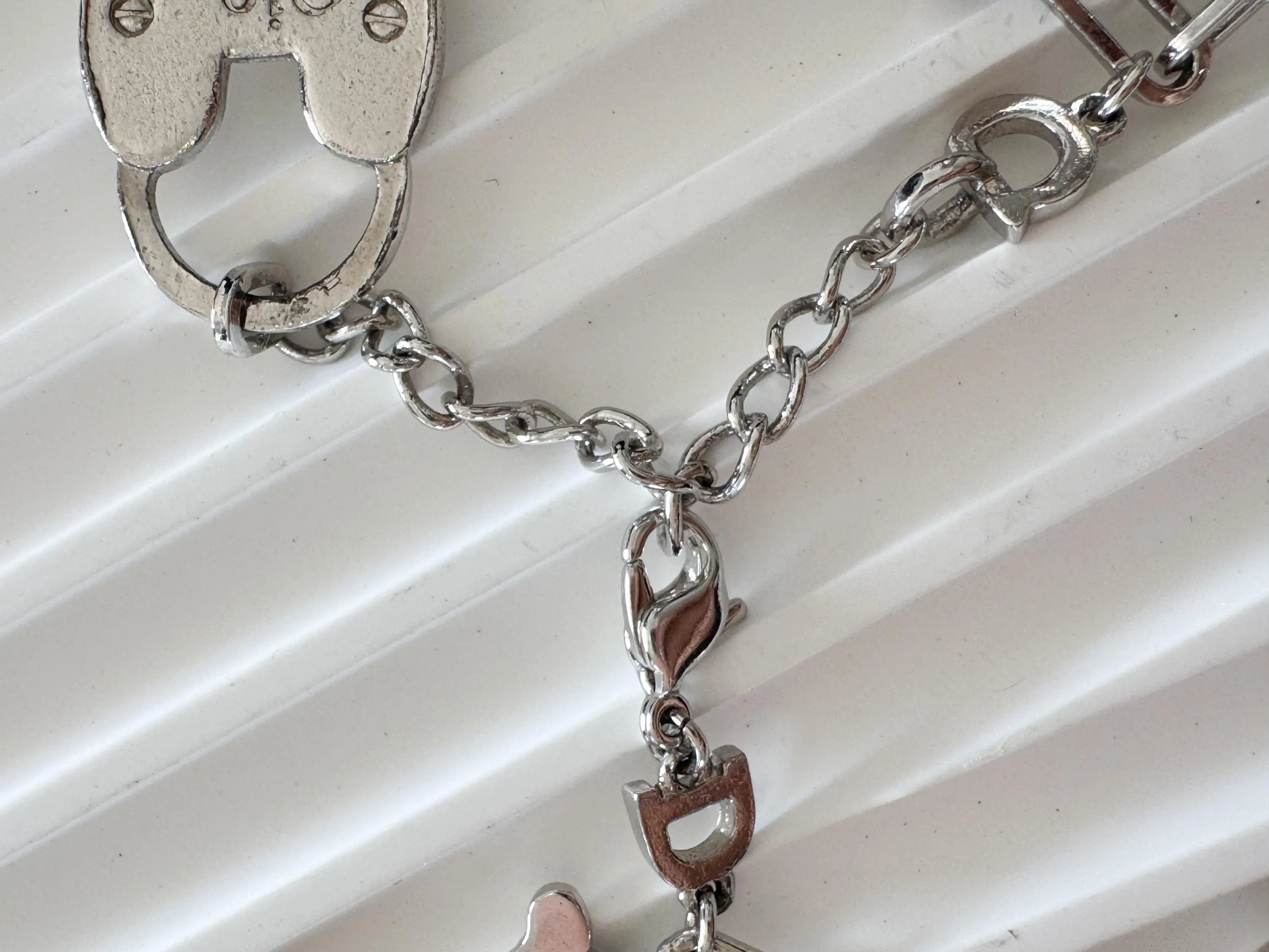 Vintage Christian Dior Silver Tone Logo Bracelet Vintage Multi-Charms Heart Lock John Galliano time, Statement bracelet, Vintage Jewelry