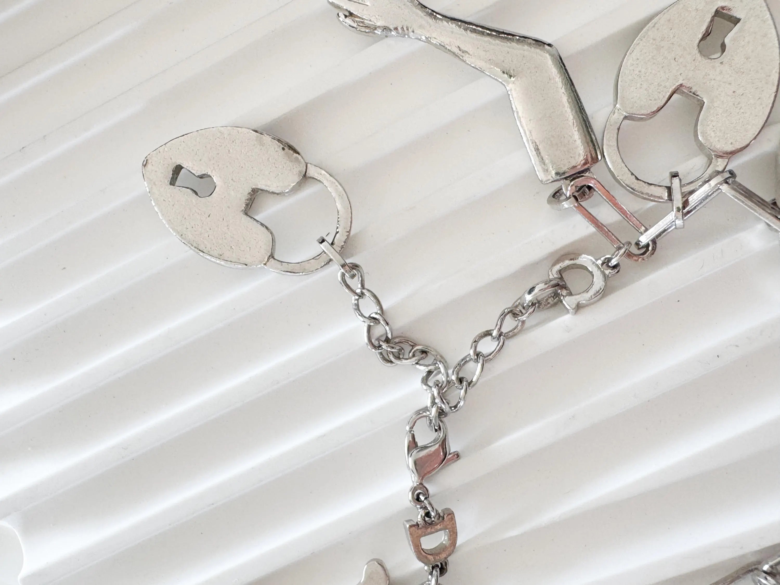 Vintage Christian Dior Silver Tone Logo Bracelet Vintage Multi-Charms Heart Lock John Galliano time, Statement bracelet, Vintage Jewelry