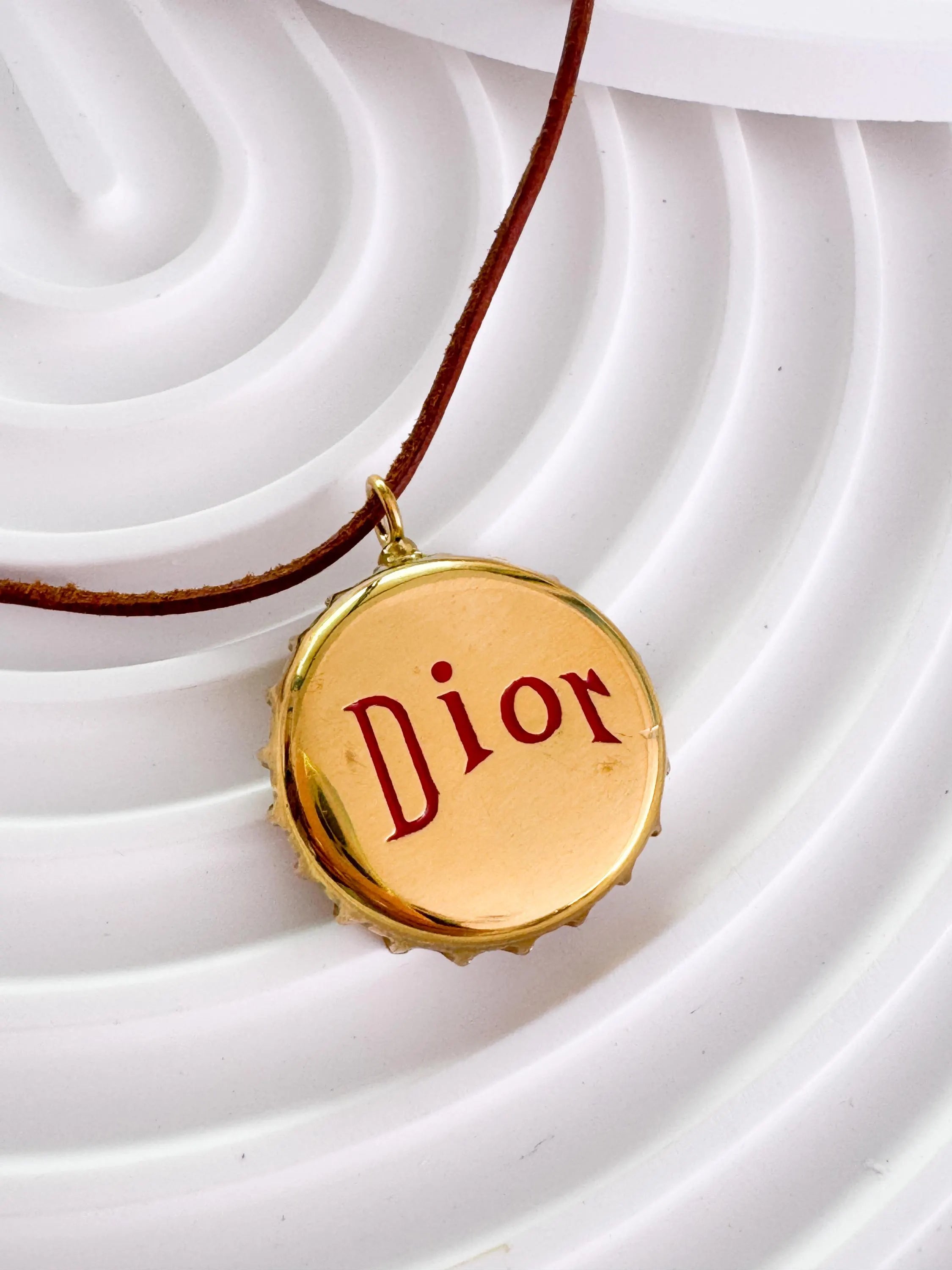 Christian Dior bottle cap necklace, vintage 1990s gold logo pendant designed by John Galliano, rare Dior jewelry