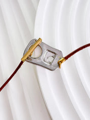 Christian Dior bottle cap necklace, vintage 1990s gold logo pendant designed by John Galliano, rare Dior jewelry