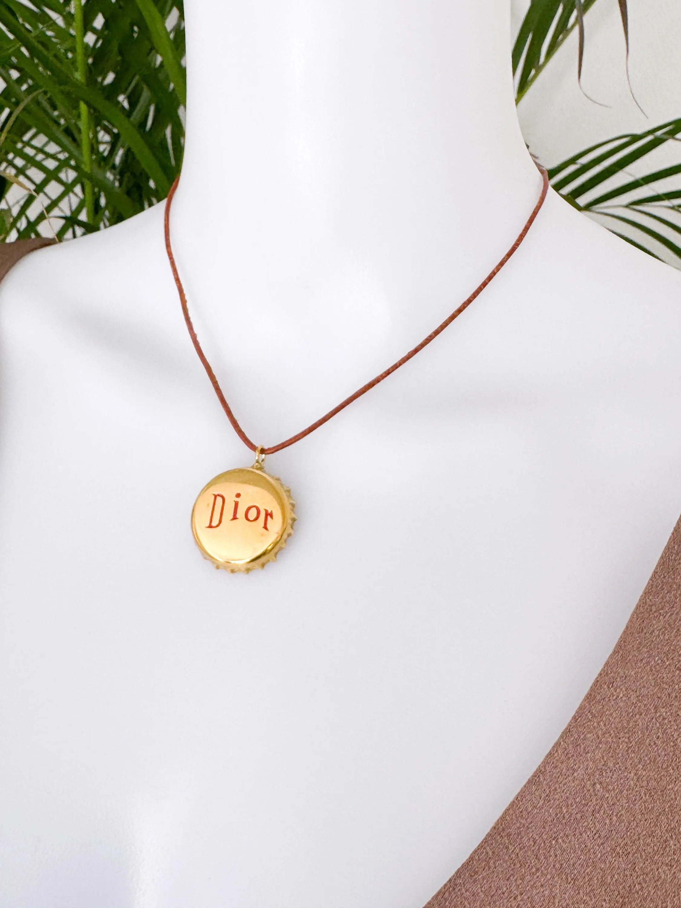 Christian Dior bottle cap necklace, vintage 1990s gold logo pendant designed by John Galliano, rare Dior jewelry
