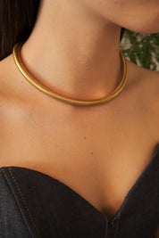 Vintage Christian Dior gold chain necklace with tubogas snake chain design, zipper choker style, unisex luxury jewelry gift