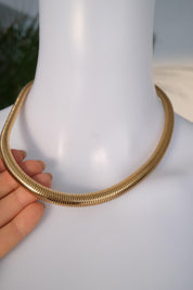 Vintage Christian Dior gold chain necklace with tubogas snake chain design, zipper choker style, unisex luxury jewelry gift