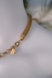 Vintage Christian Dior gold chain necklace with tubogas snake chain design, zipper choker style, unisex luxury jewelry gift