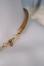 Vintage Christian Dior gold chain necklace with tubogas snake chain design, zipper choker style, unisex luxury jewelry gift