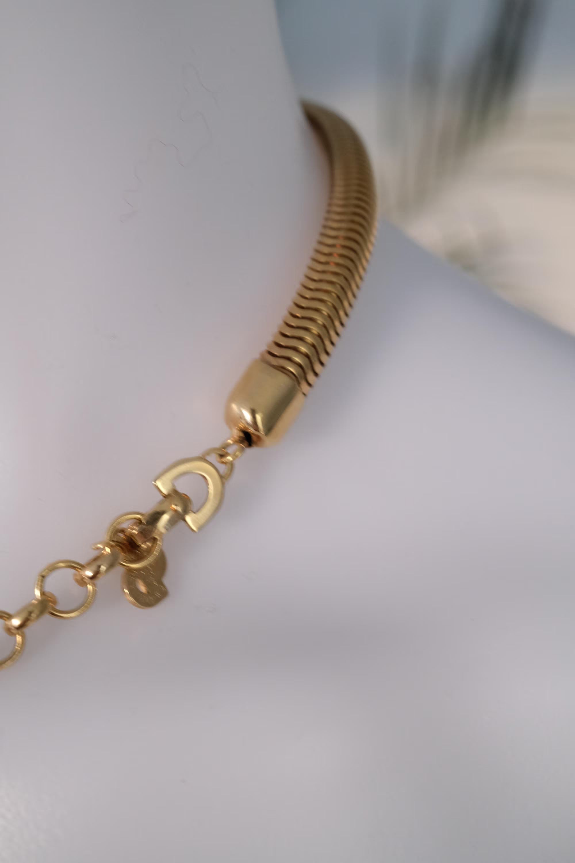 Vintage Christian Dior gold chain necklace with tubogas snake chain design, zipper choker style, unisex luxury jewelry gift