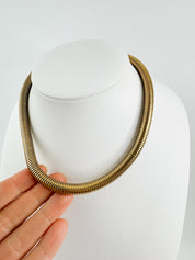 Vintage Christian Dior gold chain necklace with tubogas snake chain design, zipper choker style, unisex luxury jewelry gift
