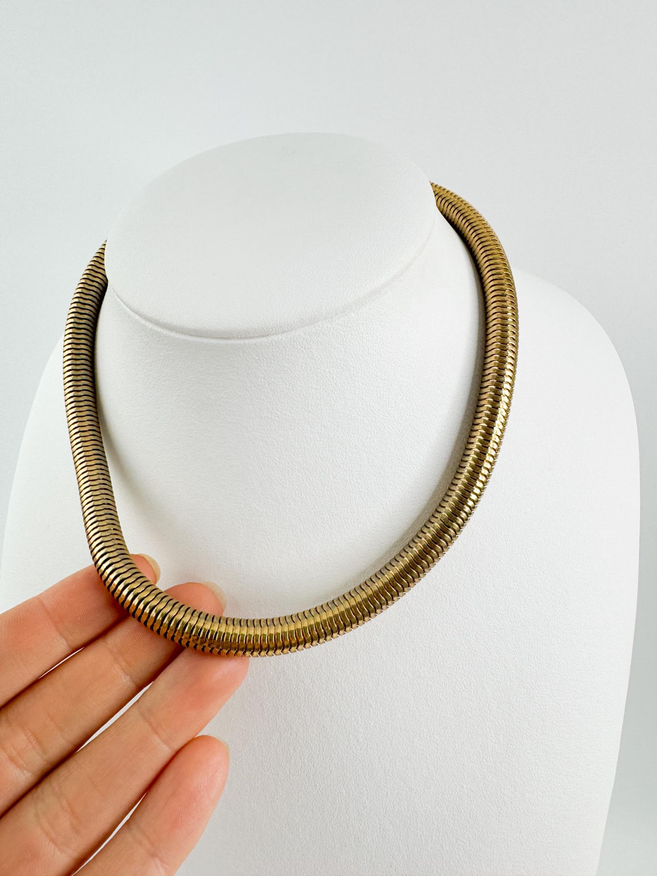 Vintage Christian Dior gold chain necklace with tubogas snake chain design, zipper choker style, unisex luxury jewelry gift