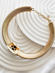 Christian Dior vintage gold-tone choker necklace with black and clear crystal charm, elegant designer jewelry