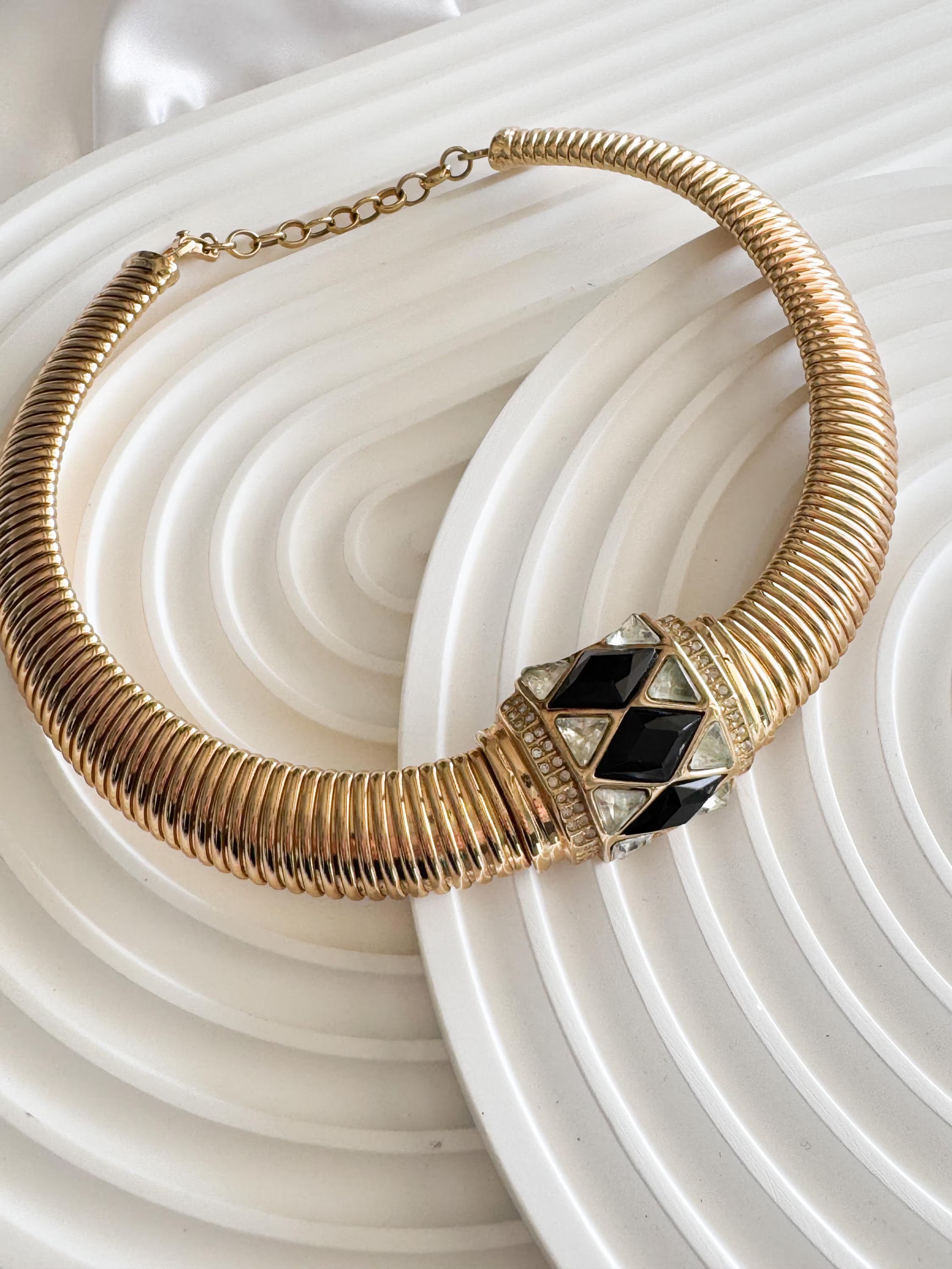Christian Dior vintage gold-tone choker necklace with black and clear crystal charm, elegant designer jewelry