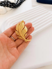 Large Dior gold leaf brooch statement luxury accessory elegant styling