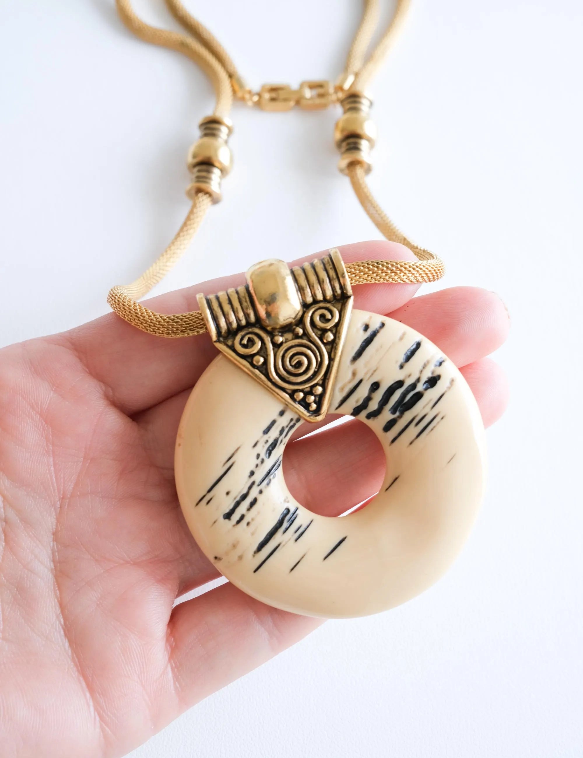 Elegant vintage Givenchy 1977 gold tone resin pendant necklace sculptural runway statement luxury jewelry