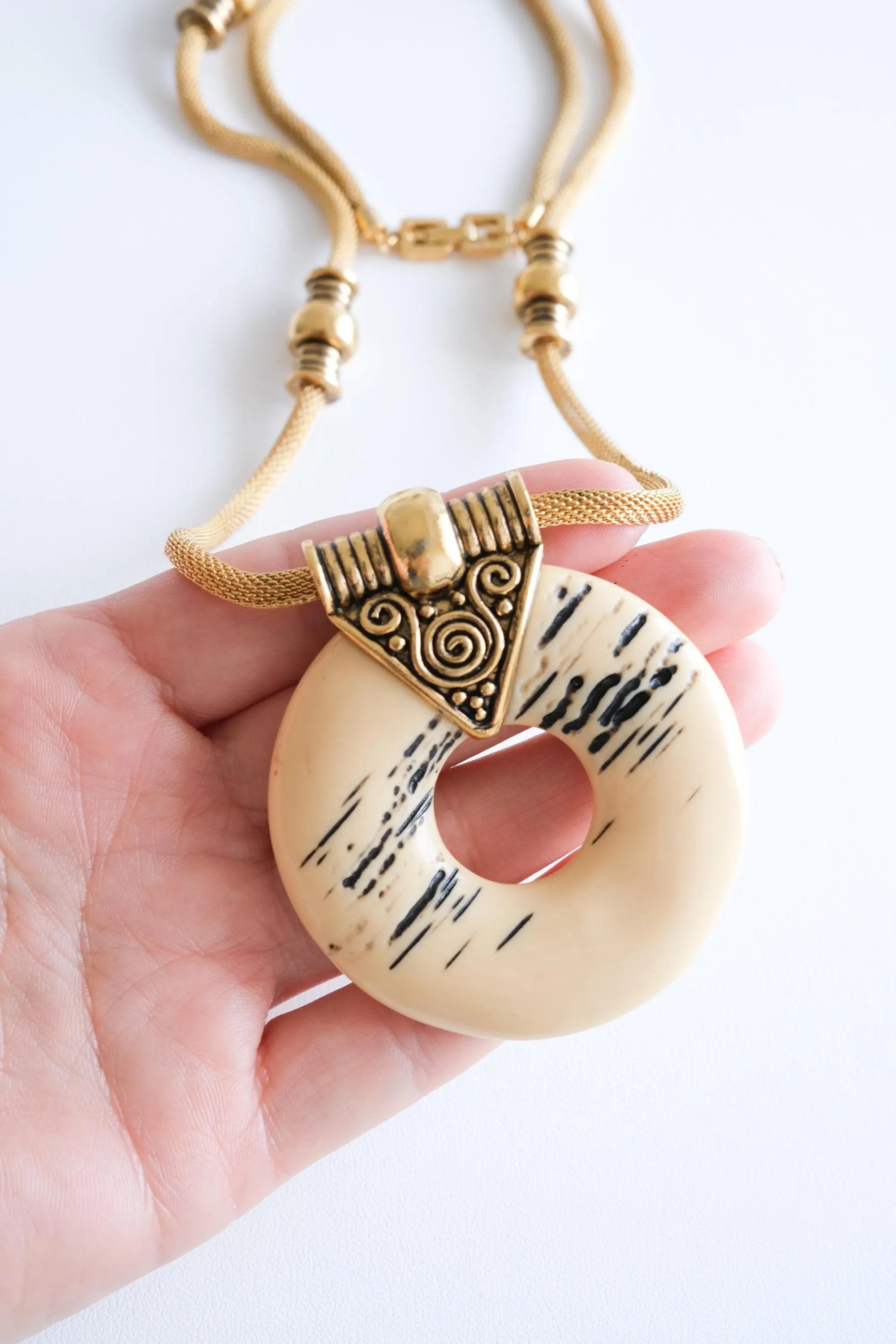 Elegant vintage Givenchy 1977 gold tone resin pendant necklace sculptural runway statement luxury jewelry