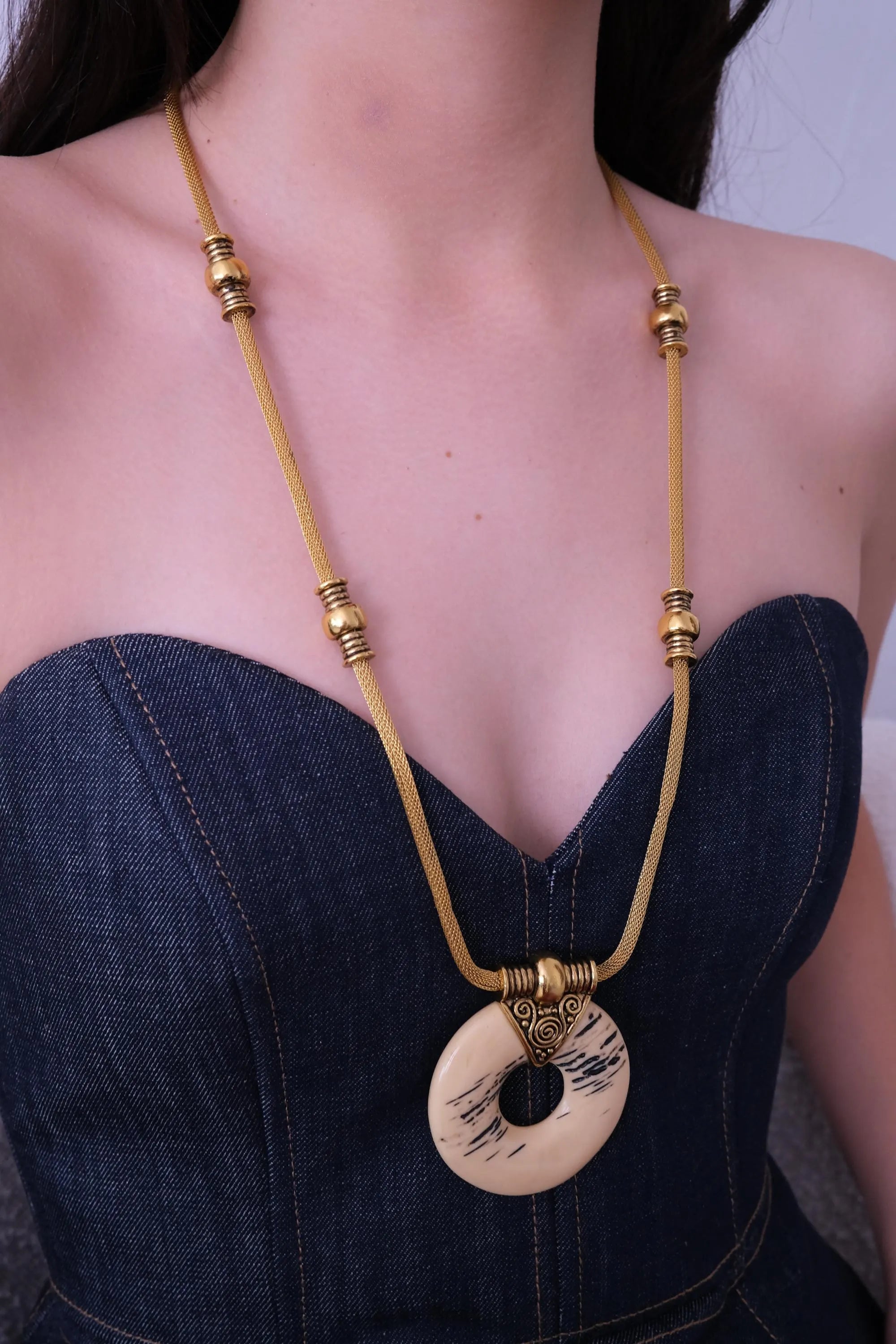 Elegant vintage Givenchy 1977 gold tone resin pendant necklace sculptural runway statement luxury jewelry