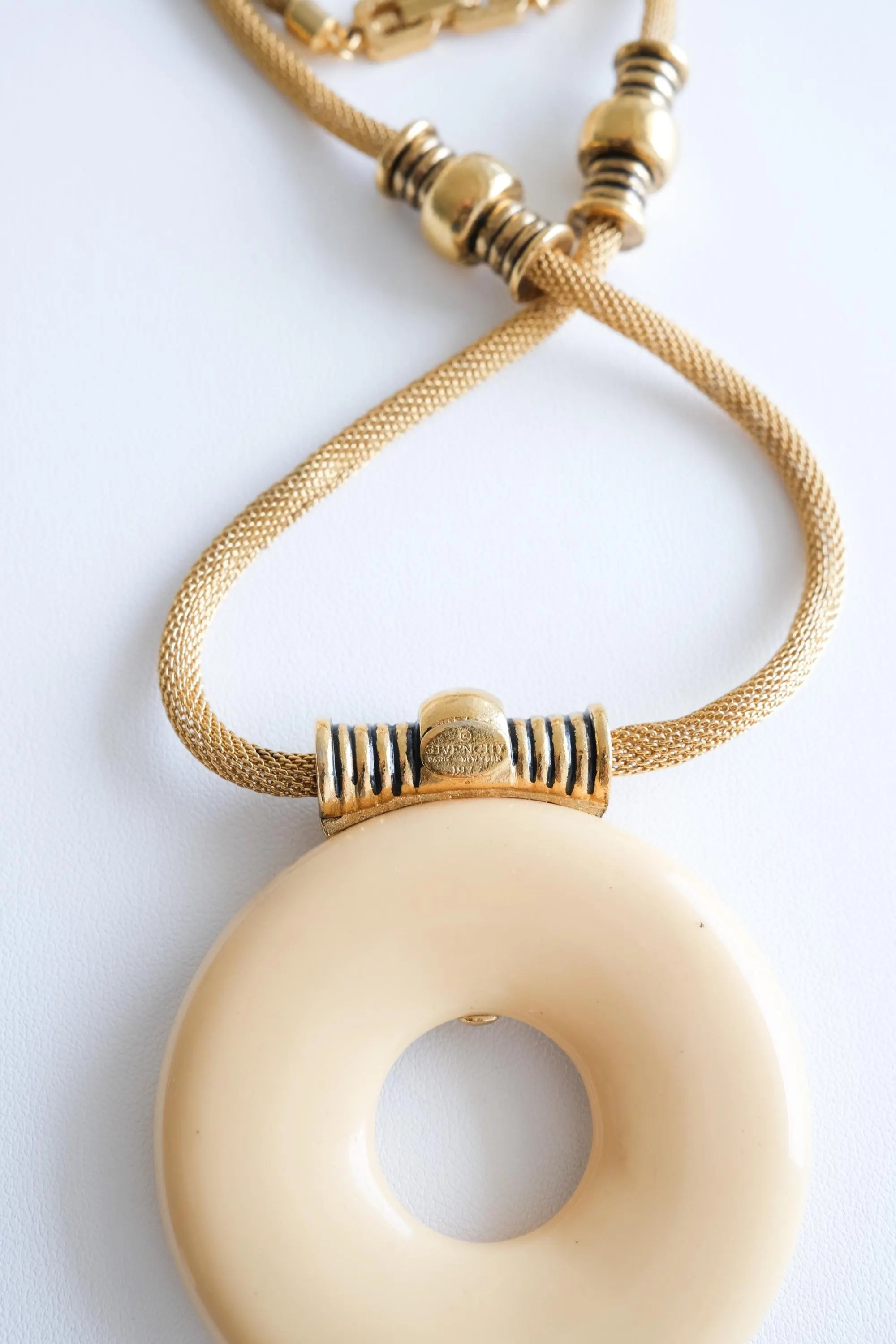 Vintage Givenchy 1977 gold resin pendant necklace sculptural timeless elegant luxury