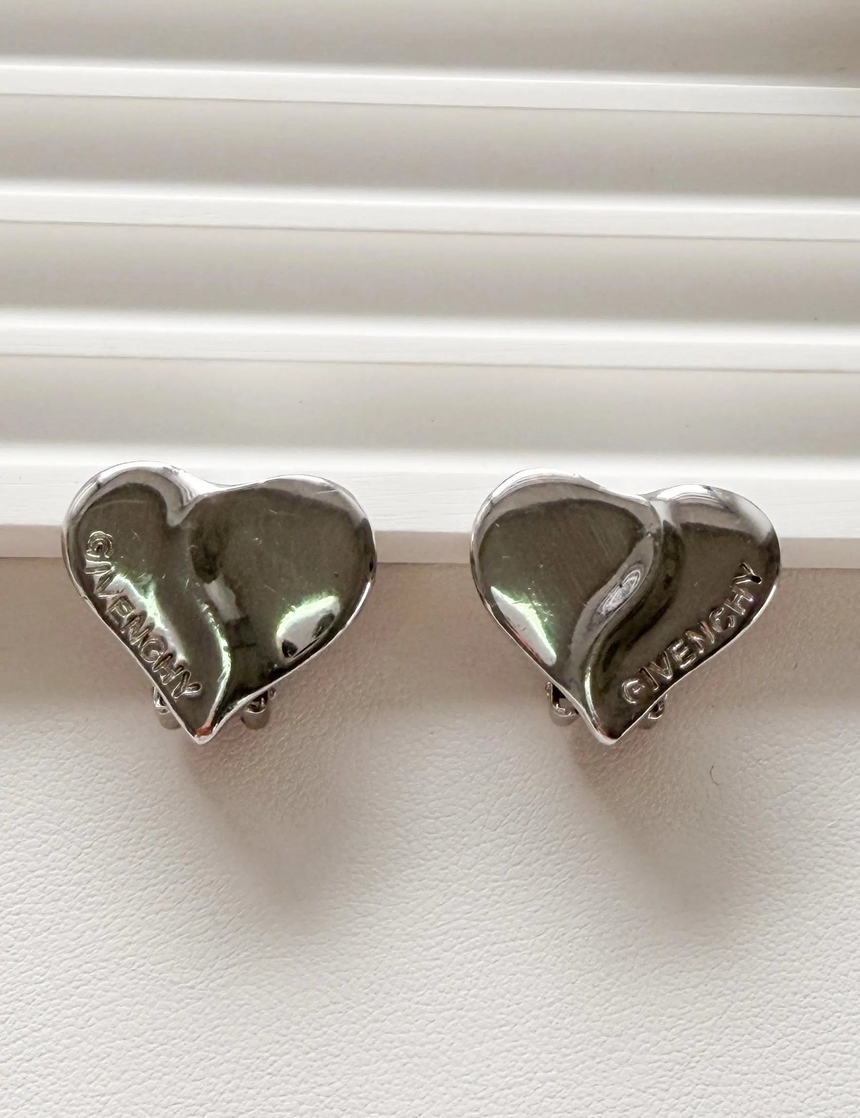 Elegant vintage Givenchy Paris silver tone heart earrings logo refined everyday luxury jewelry