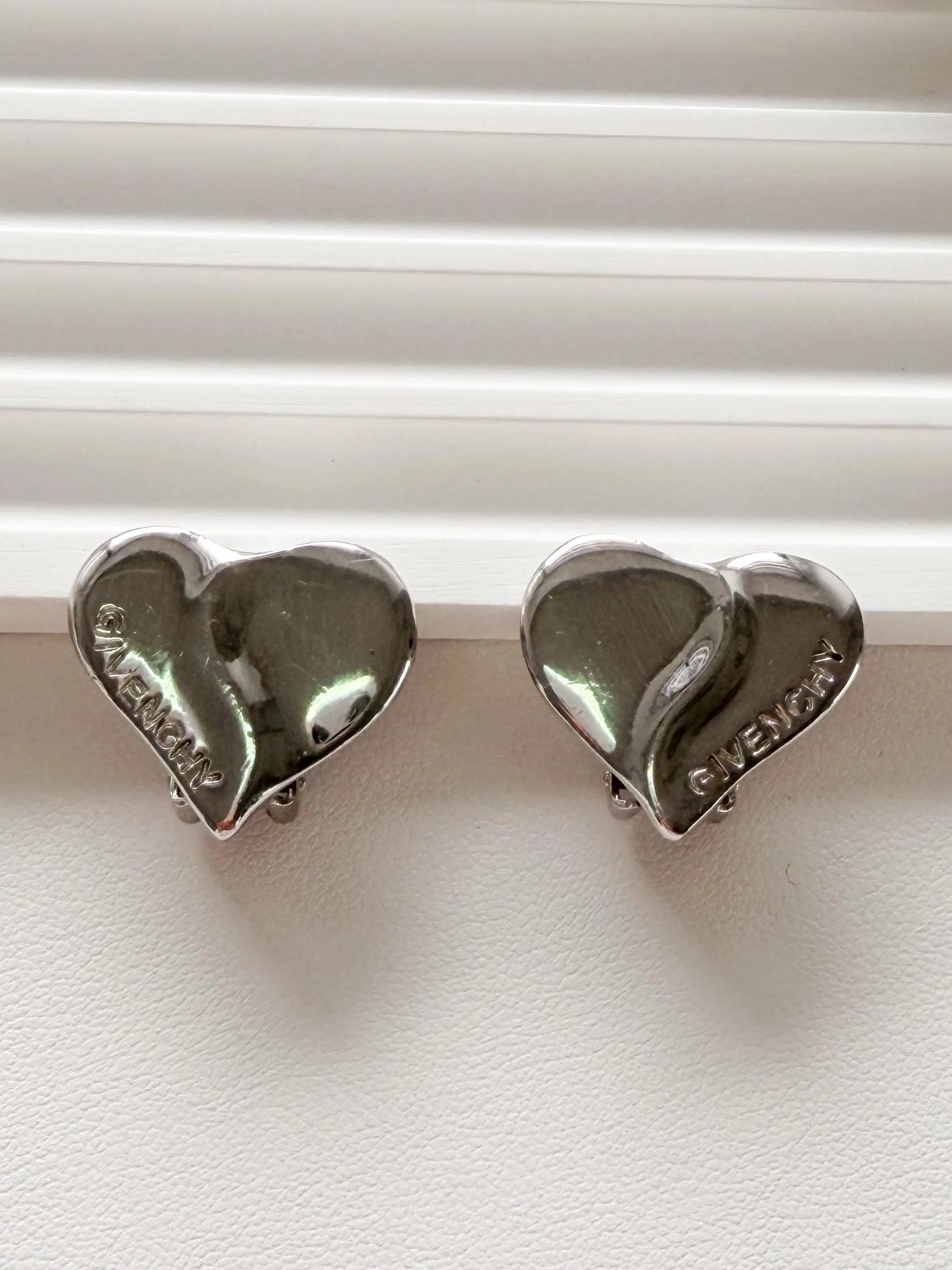 Elegant vintage Givenchy Paris silver tone heart earrings logo refined everyday luxury jewelry