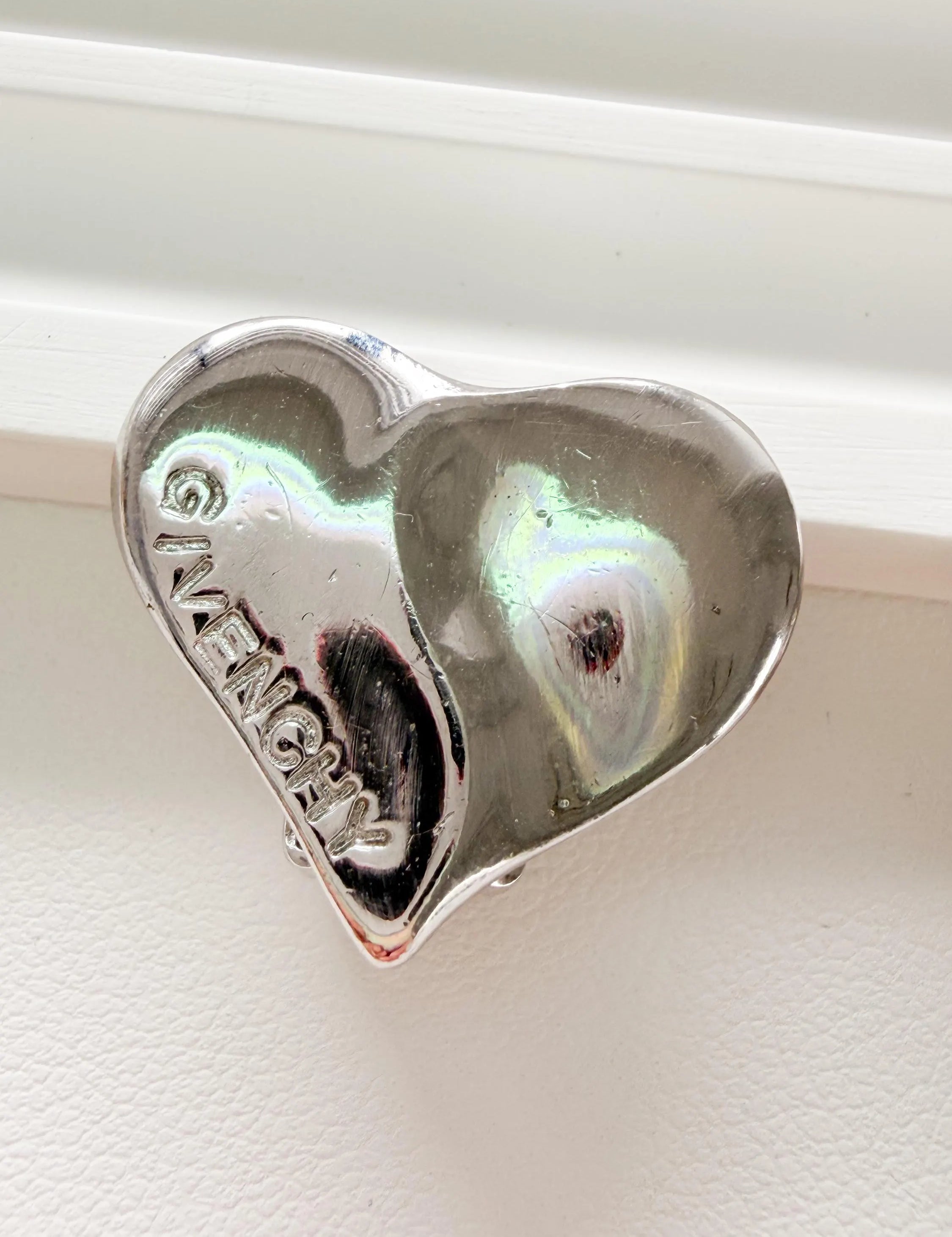 Elegant vintage Givenchy Paris silver tone heart earrings logo refined everyday luxury jewelry