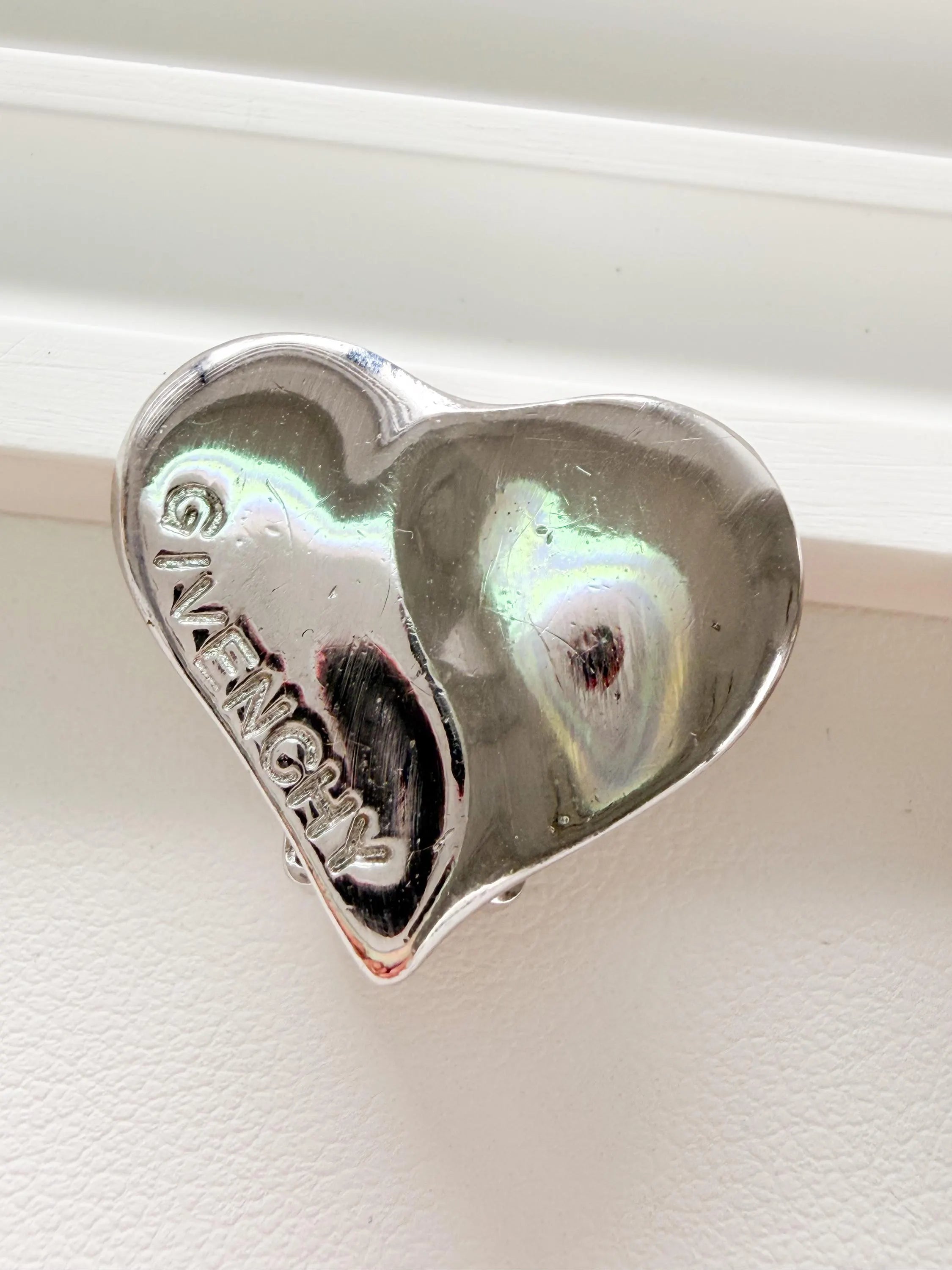 Elegant vintage Givenchy Paris silver tone heart earrings logo refined everyday luxury jewelry