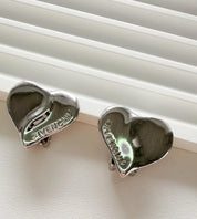 Givenchy Paris vintage silver heart earrings logo feminine elegant everyday luxury