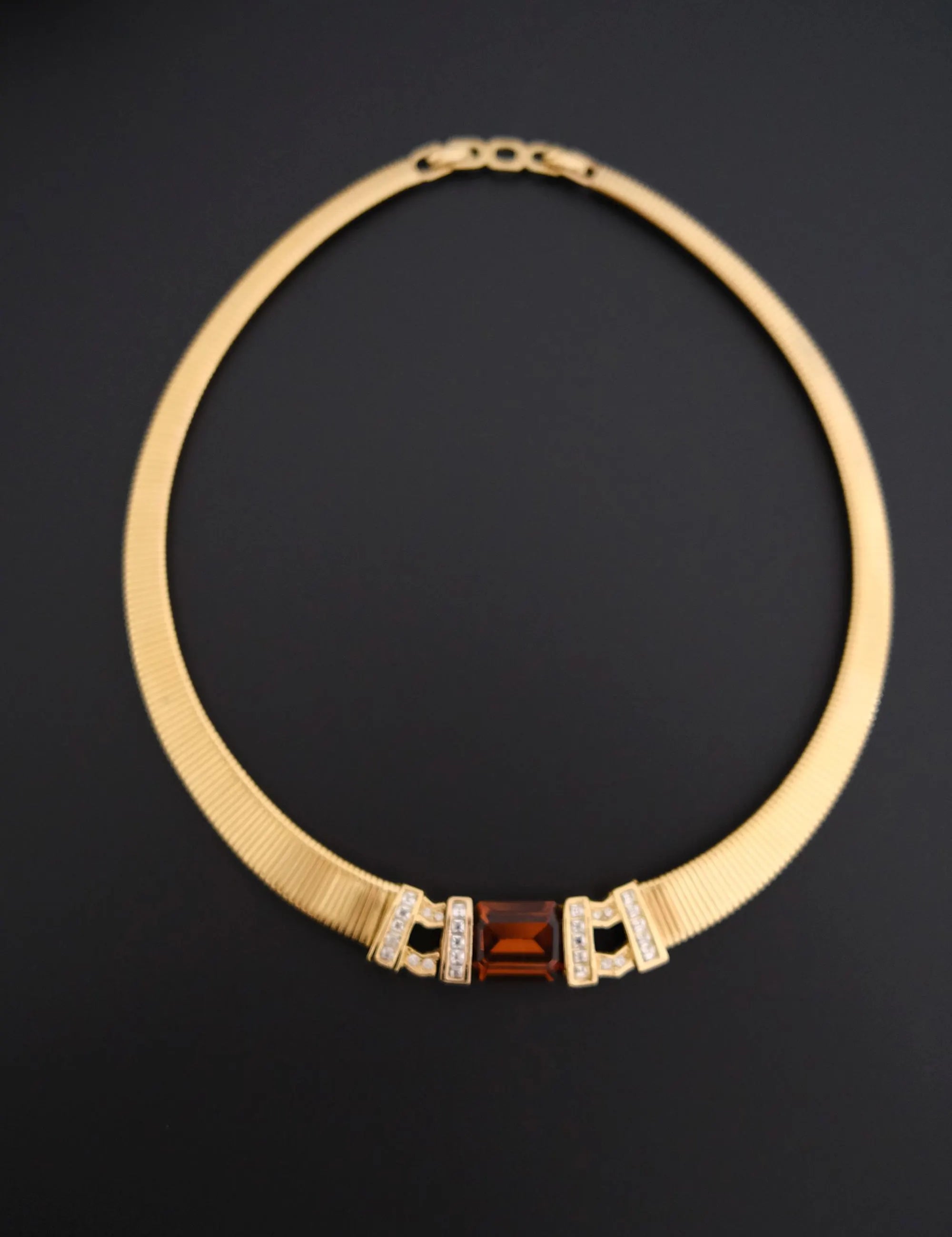 Rare vintage Christian Dior gold-tone ribbed choker necklace with smoky brown faceted crystal centerpiece