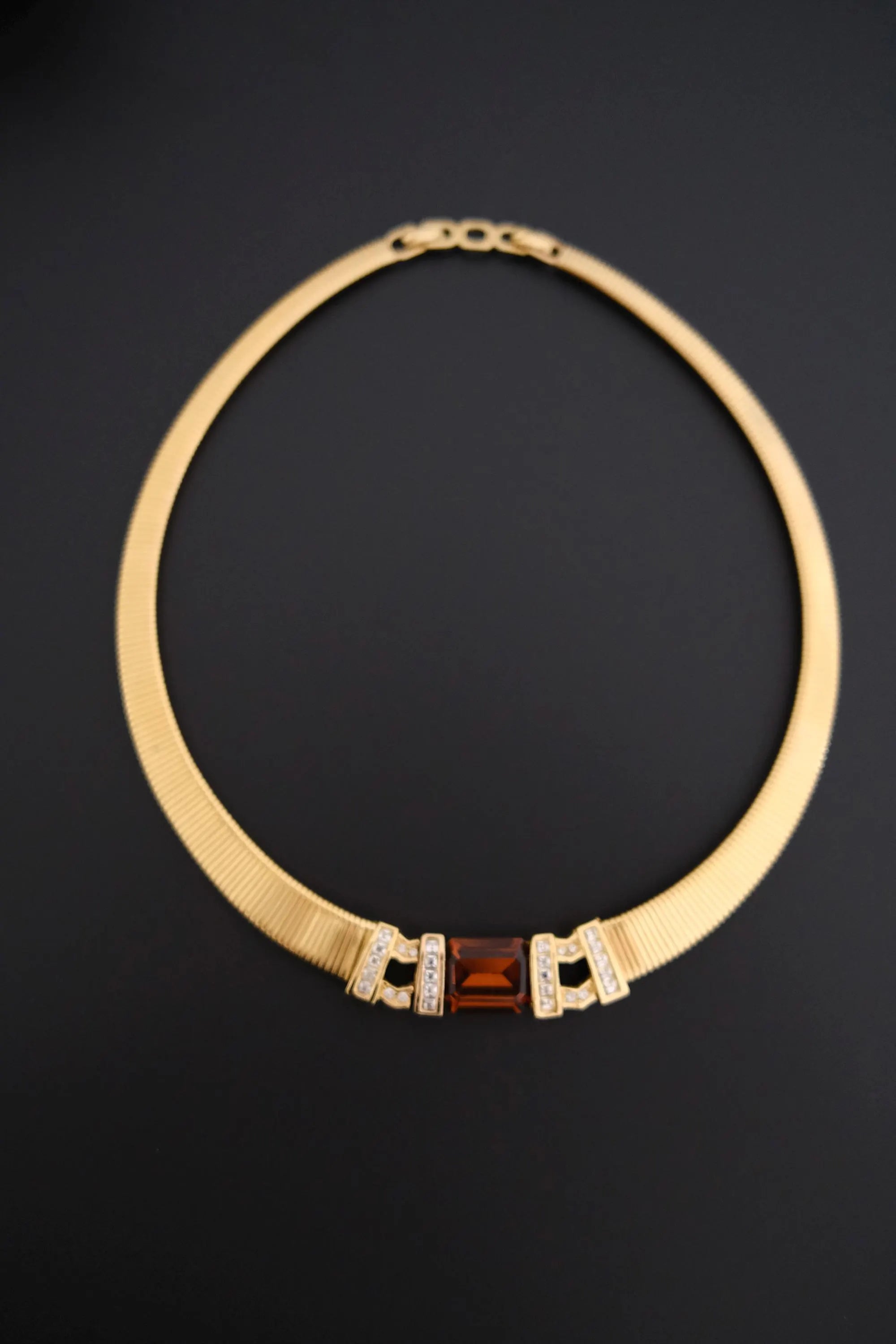 Rare vintage Christian Dior gold-tone ribbed choker necklace with smoky brown faceted crystal centerpiece