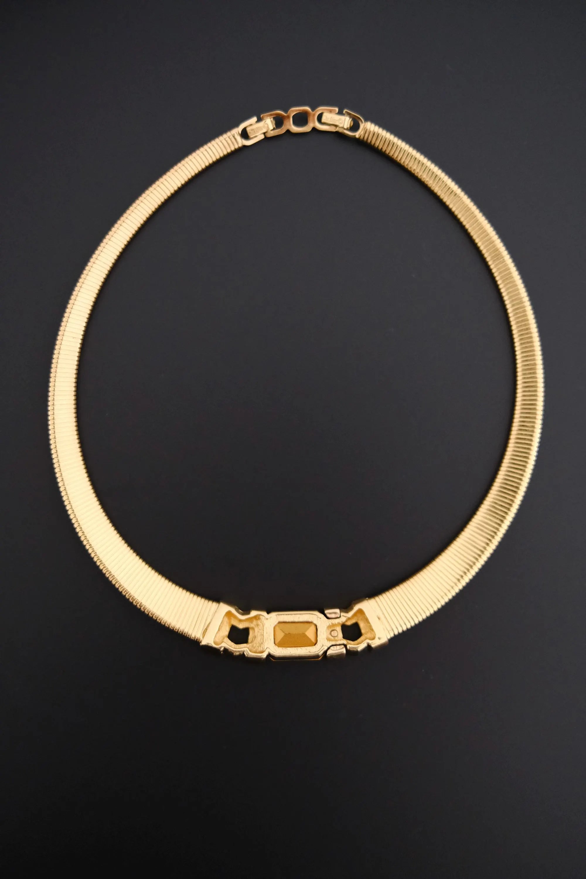 Rare vintage Christian Dior gold-tone ribbed choker necklace with smoky brown faceted crystal centerpiece