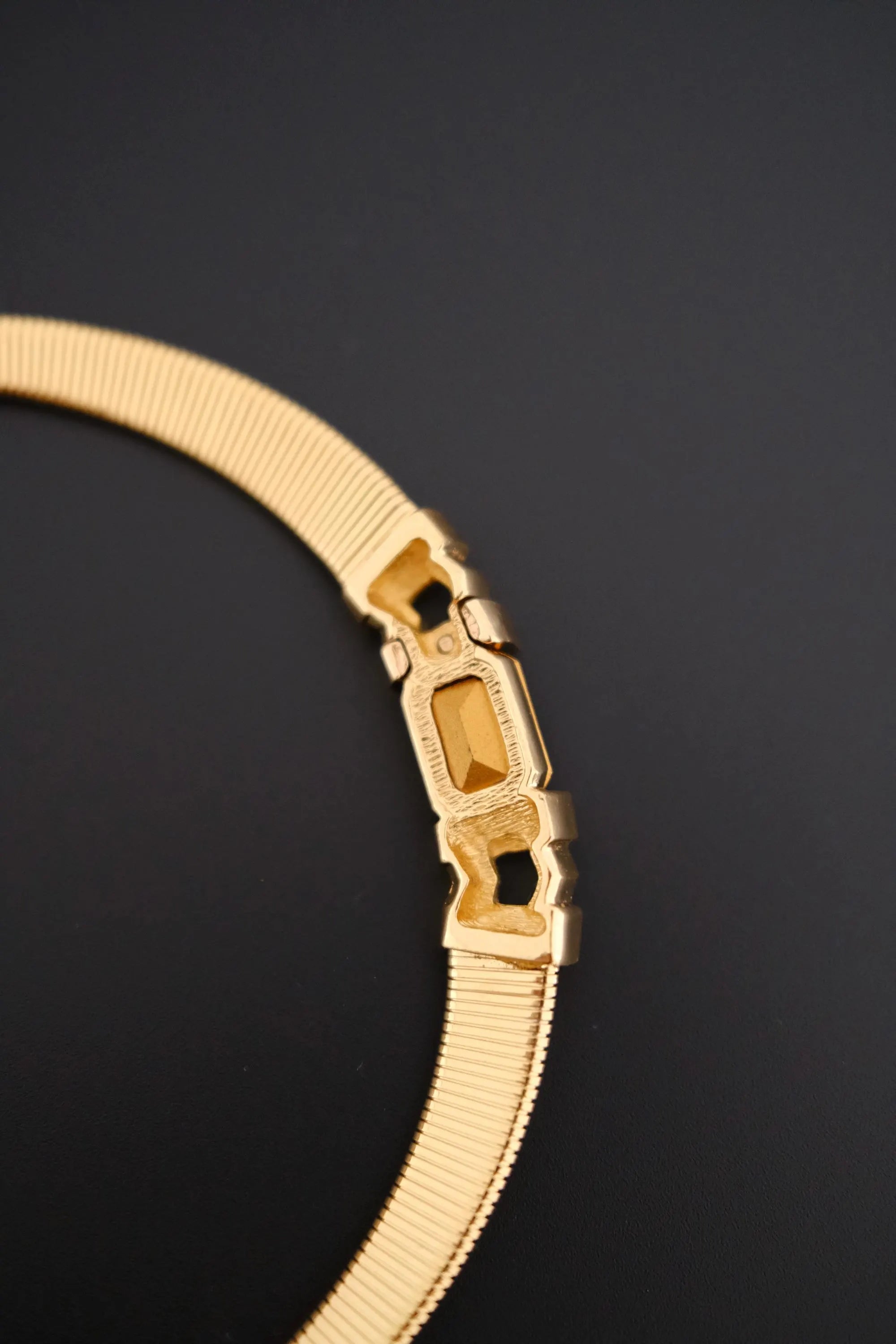 Rare vintage Christian Dior gold-tone ribbed choker necklace with smoky brown faceted crystal centerpiece