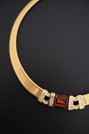 Rare vintage Christian Dior gold-tone ribbed choker necklace with smoky brown faceted crystal centerpiece