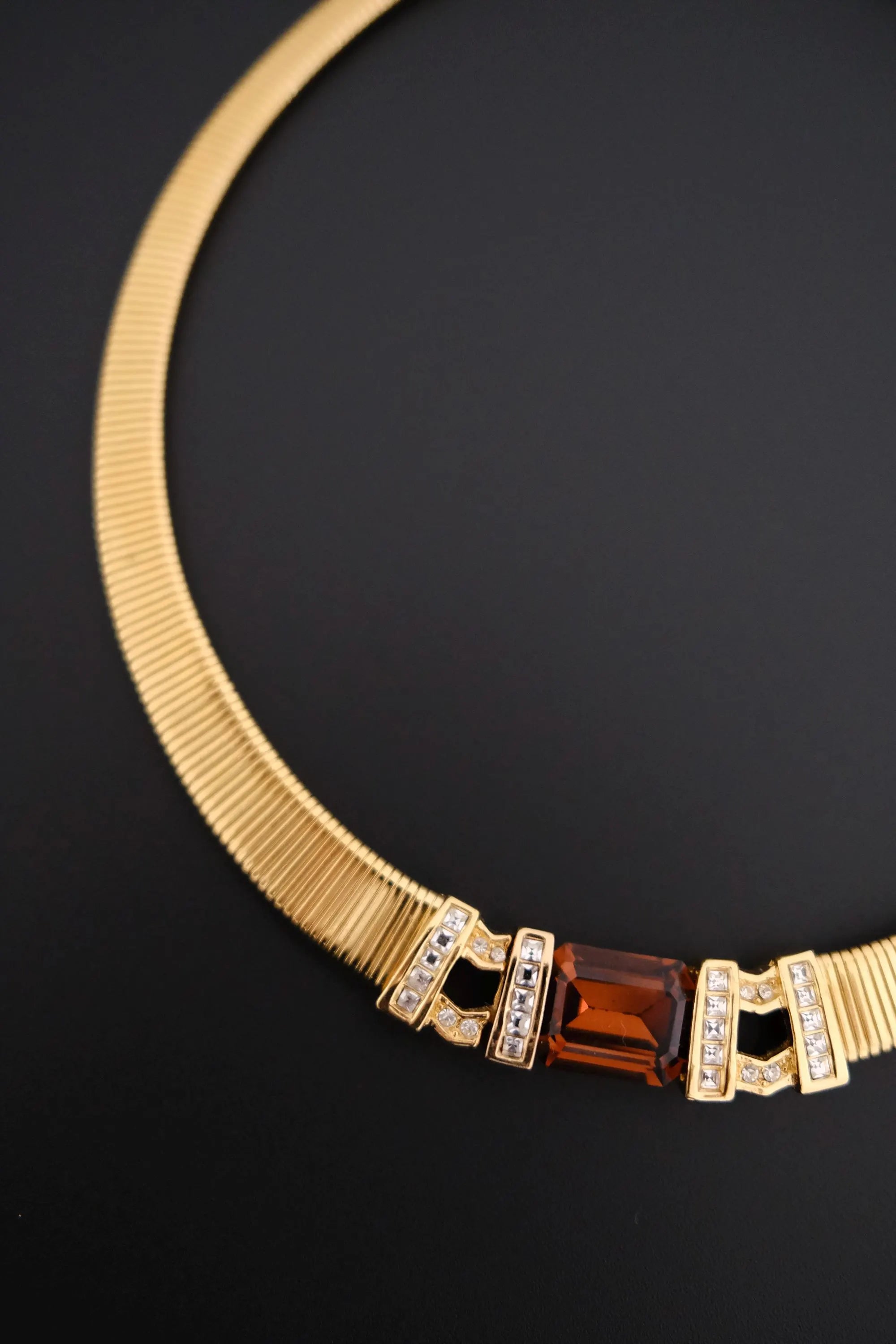 Rare vintage Christian Dior gold-tone ribbed choker necklace with smoky brown faceted crystal centerpiece