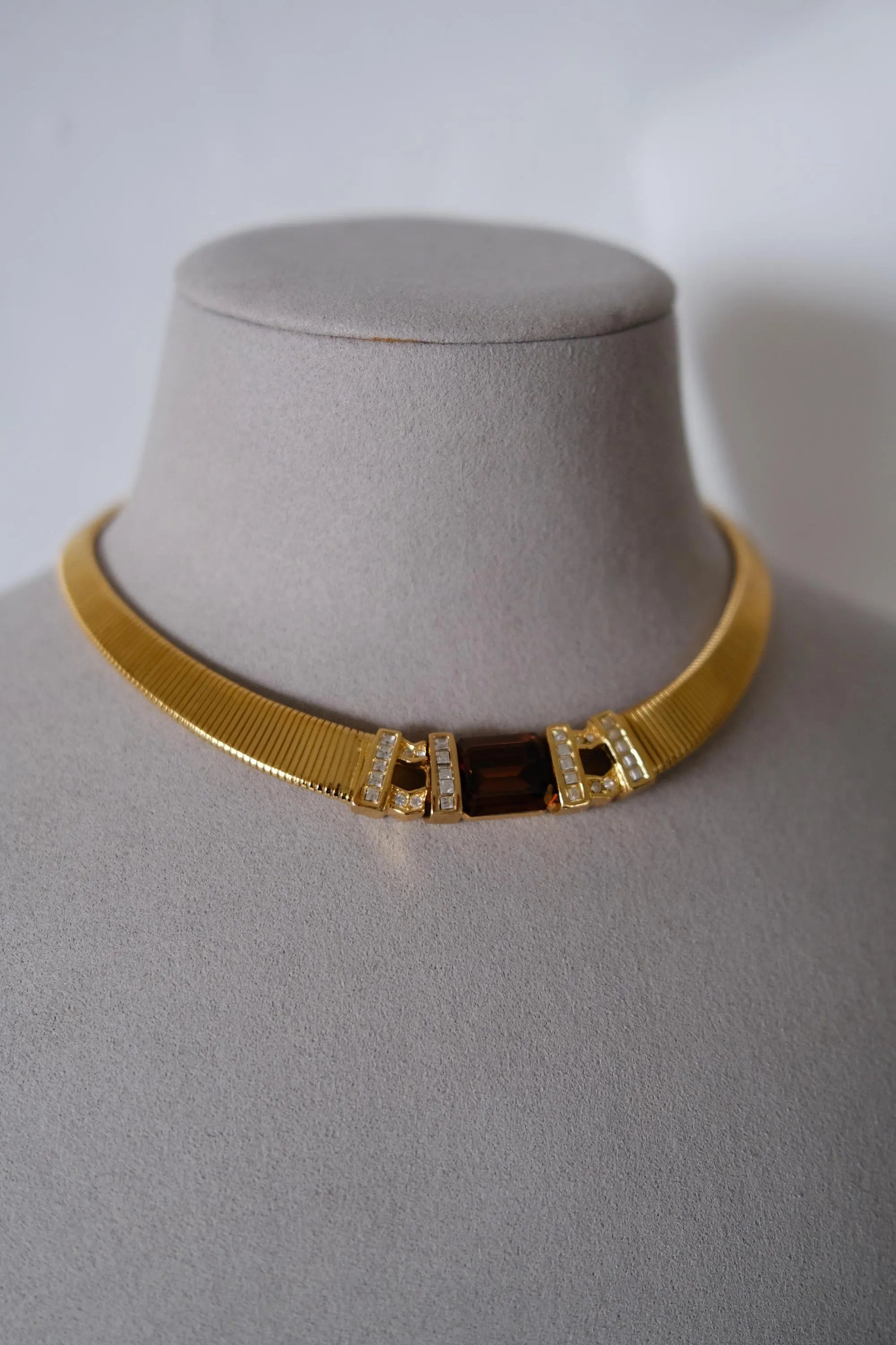 Rare vintage Christian Dior gold-tone ribbed choker necklace with smoky brown faceted crystal centerpiece