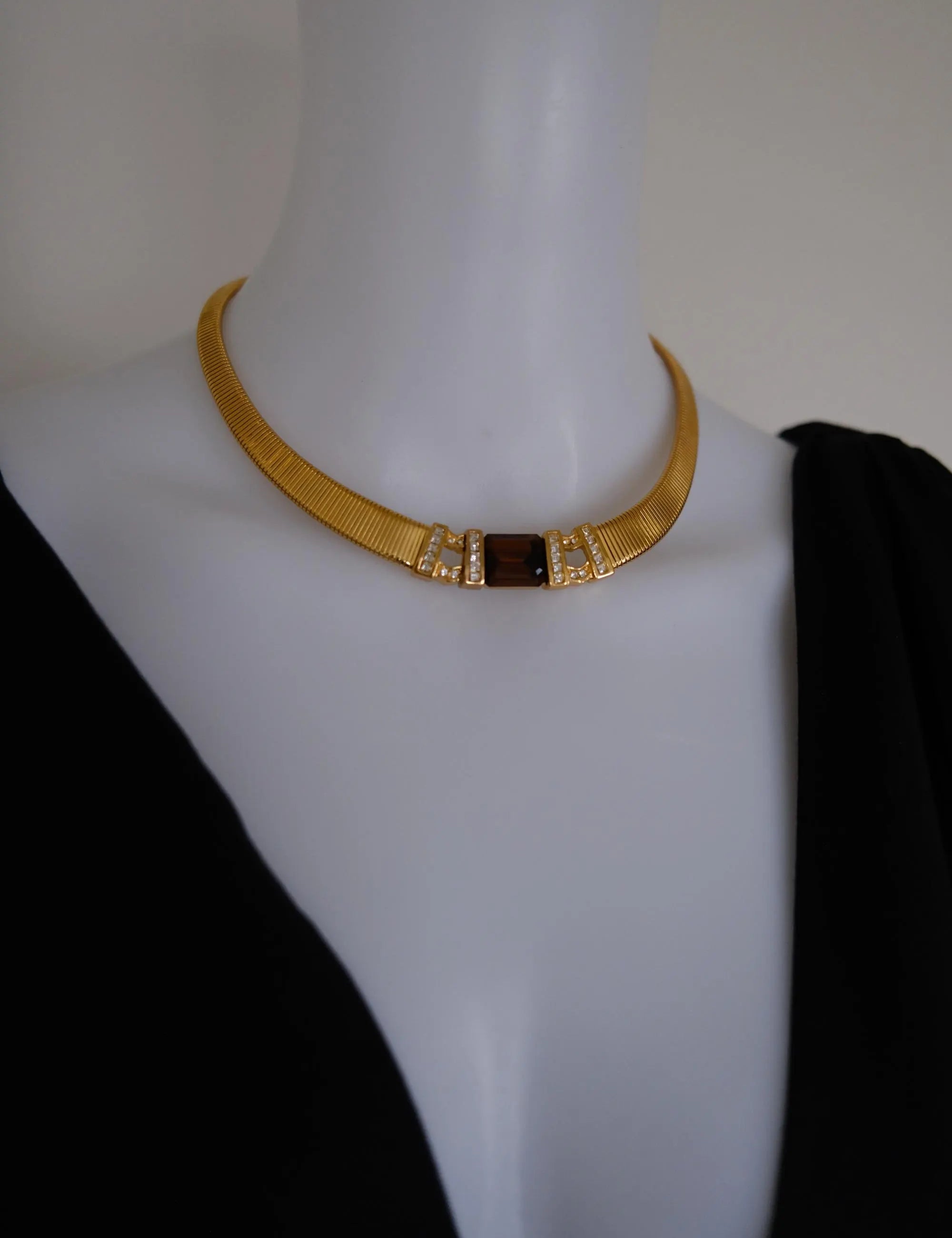 Rare vintage Christian Dior gold-tone ribbed choker necklace with smoky brown faceted crystal centerpiece