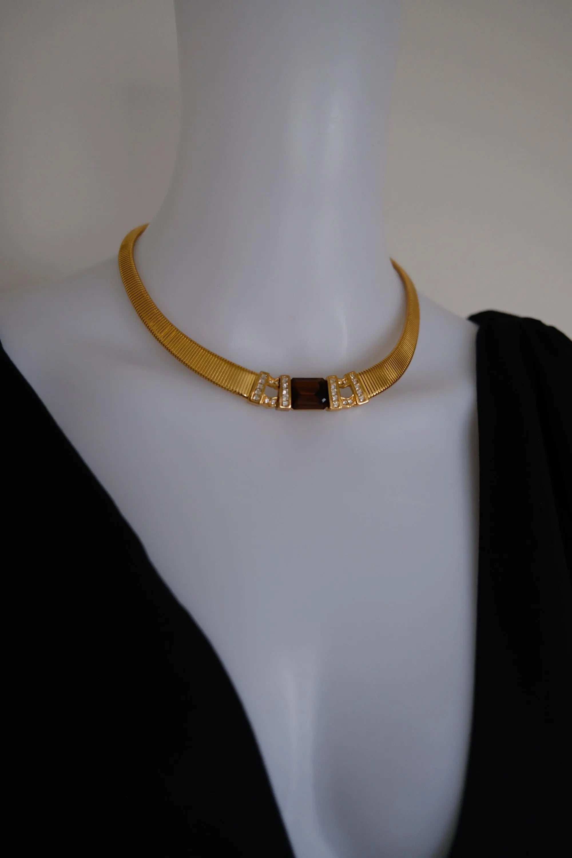 Rare vintage Christian Dior gold-tone ribbed choker necklace with smoky brown faceted crystal centerpiece