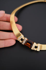 Rare vintage Christian Dior gold-tone ribbed choker necklace with smoky brown faceted crystal centerpiece