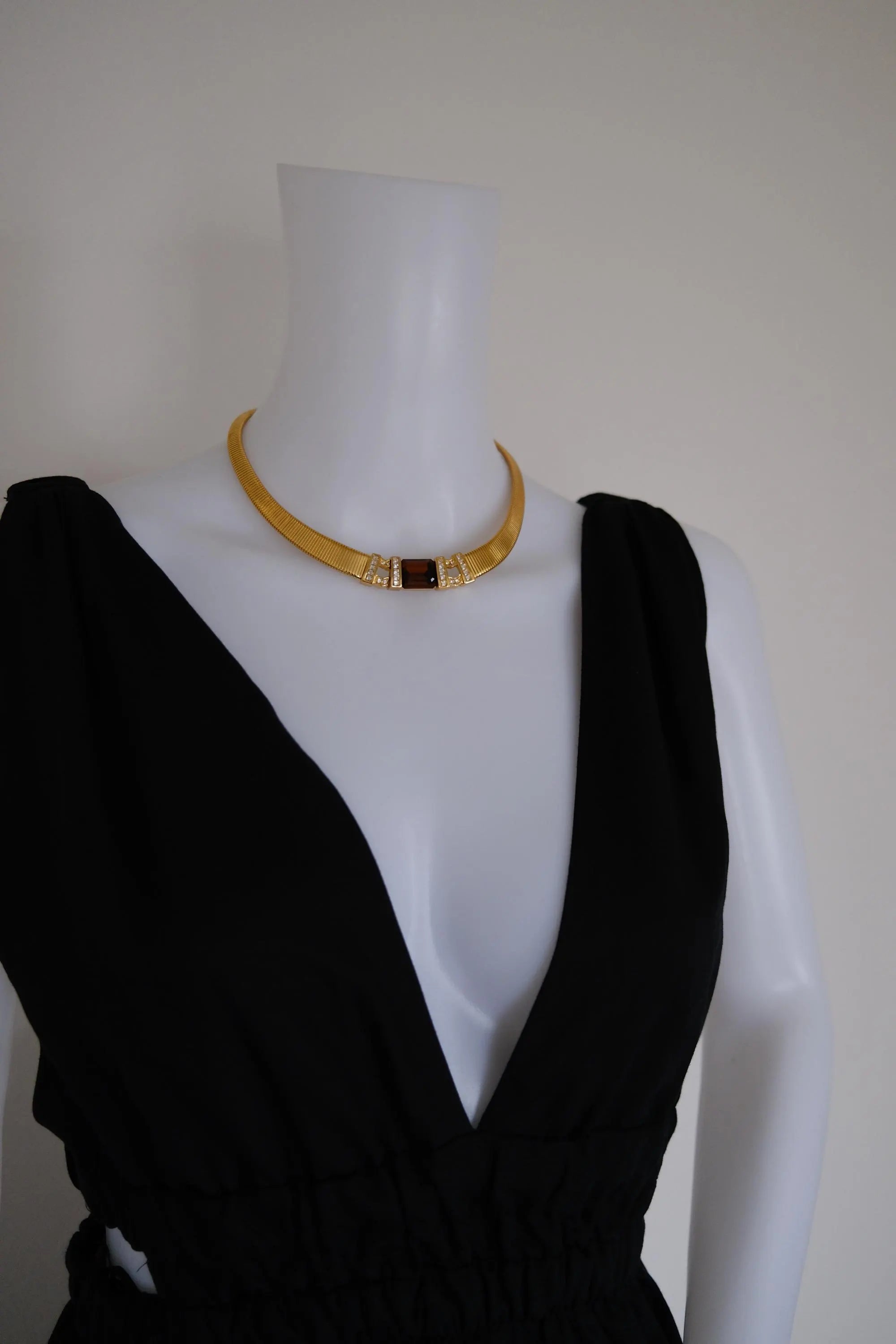 Rare vintage Christian Dior gold-tone ribbed choker necklace with smoky brown faceted crystal centerpiece