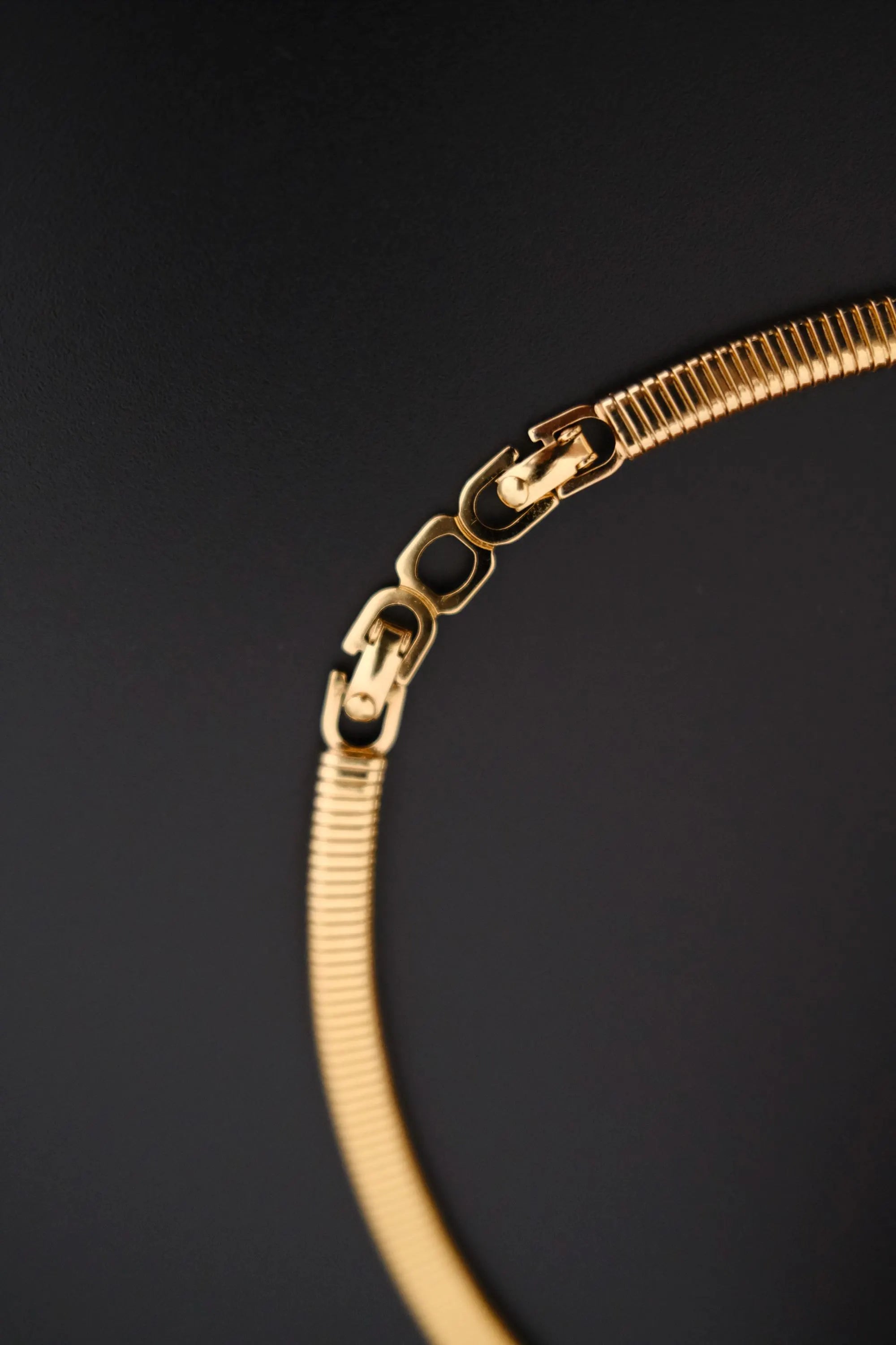Rare vintage Christian Dior gold-tone ribbed choker necklace with smoky brown faceted crystal centerpiece