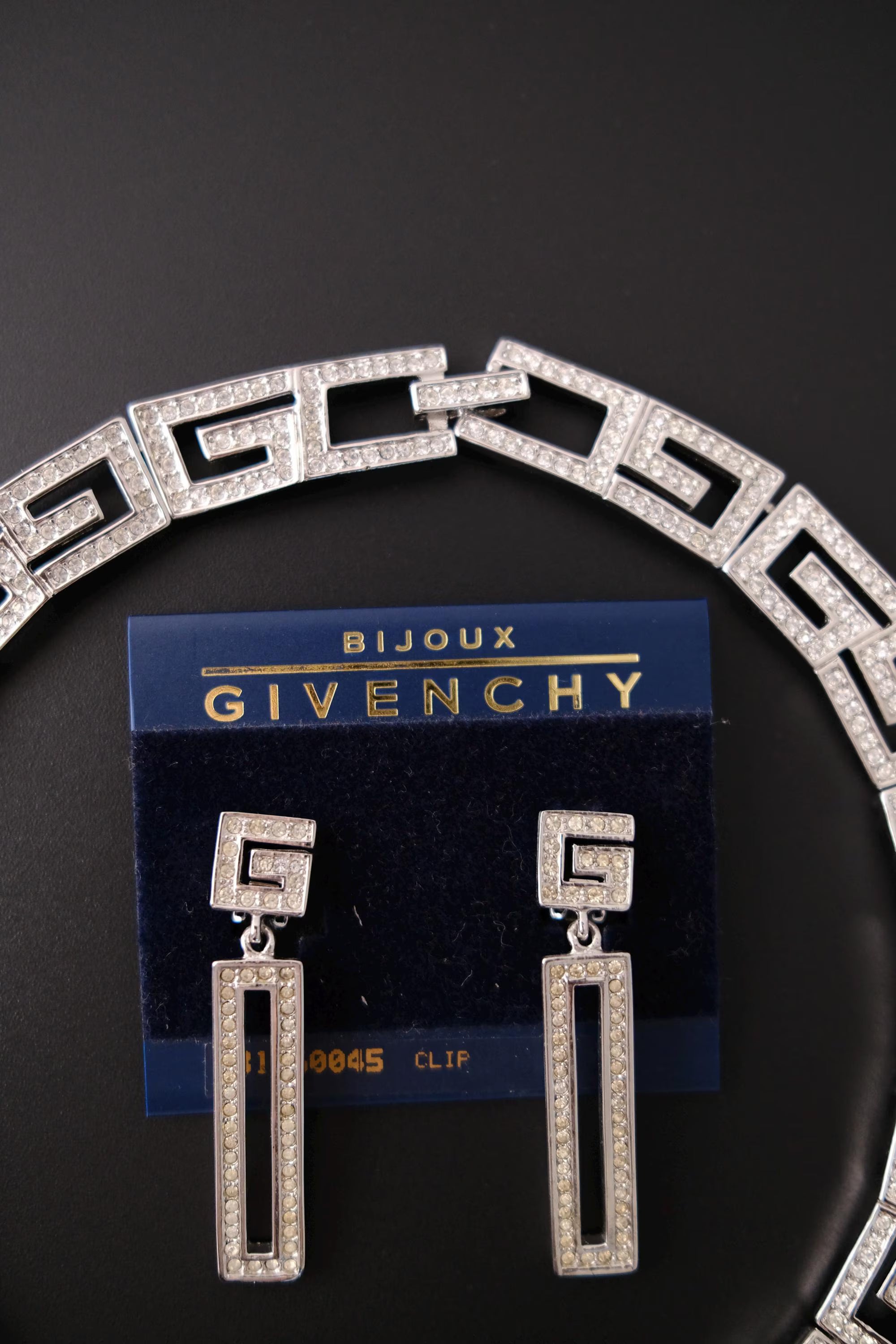 Rare vintage Givenchy crystal G logo choker necklace and matching clip-on earrings set in silver-tone metal