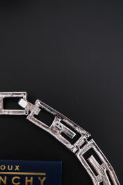 Rare vintage Givenchy crystal G logo choker necklace and matching clip-on earrings set in silver-tone metal