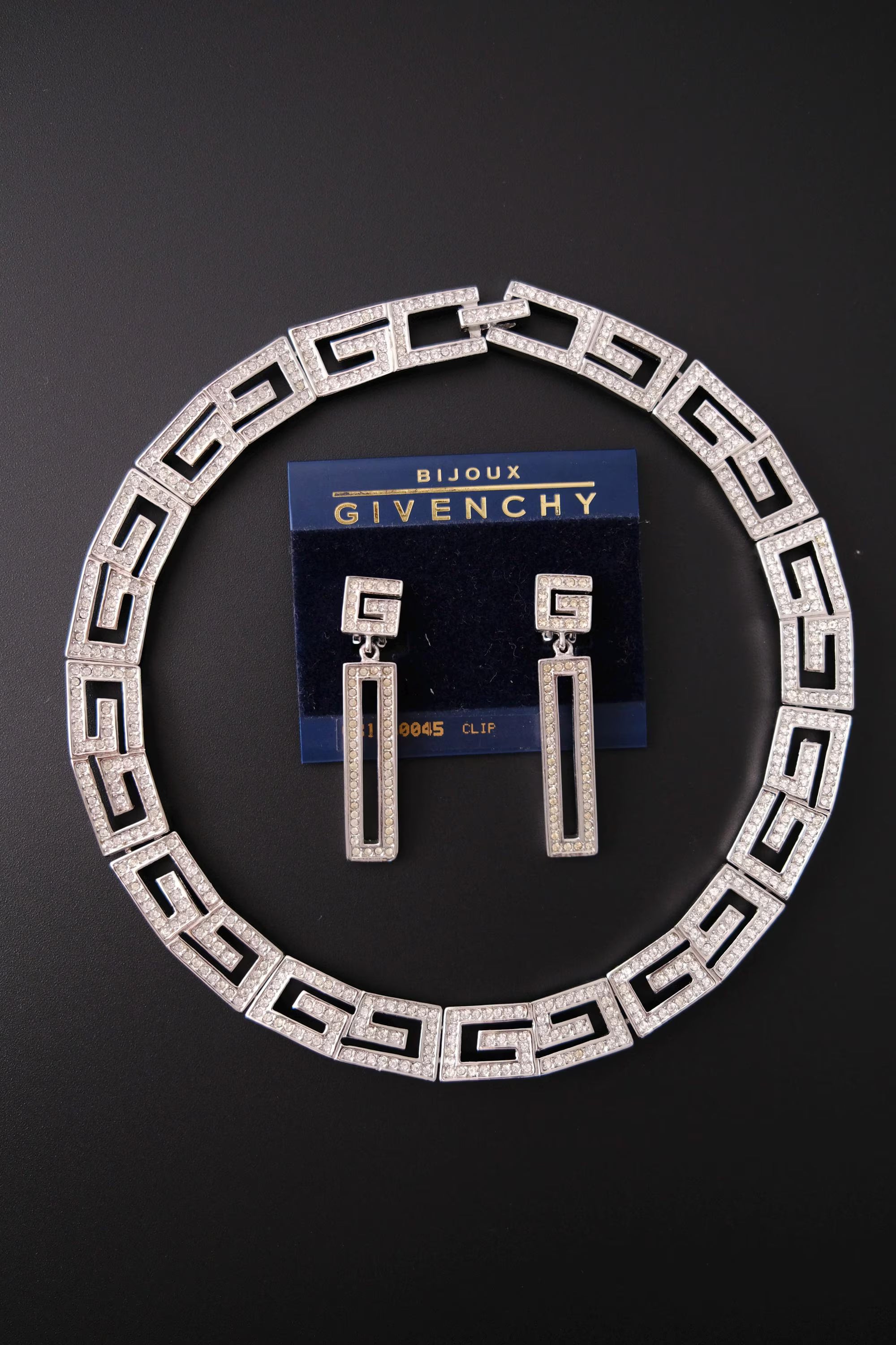 Rare vintage Givenchy crystal G logo choker necklace and matching clip-on earrings set in silver-tone metal
