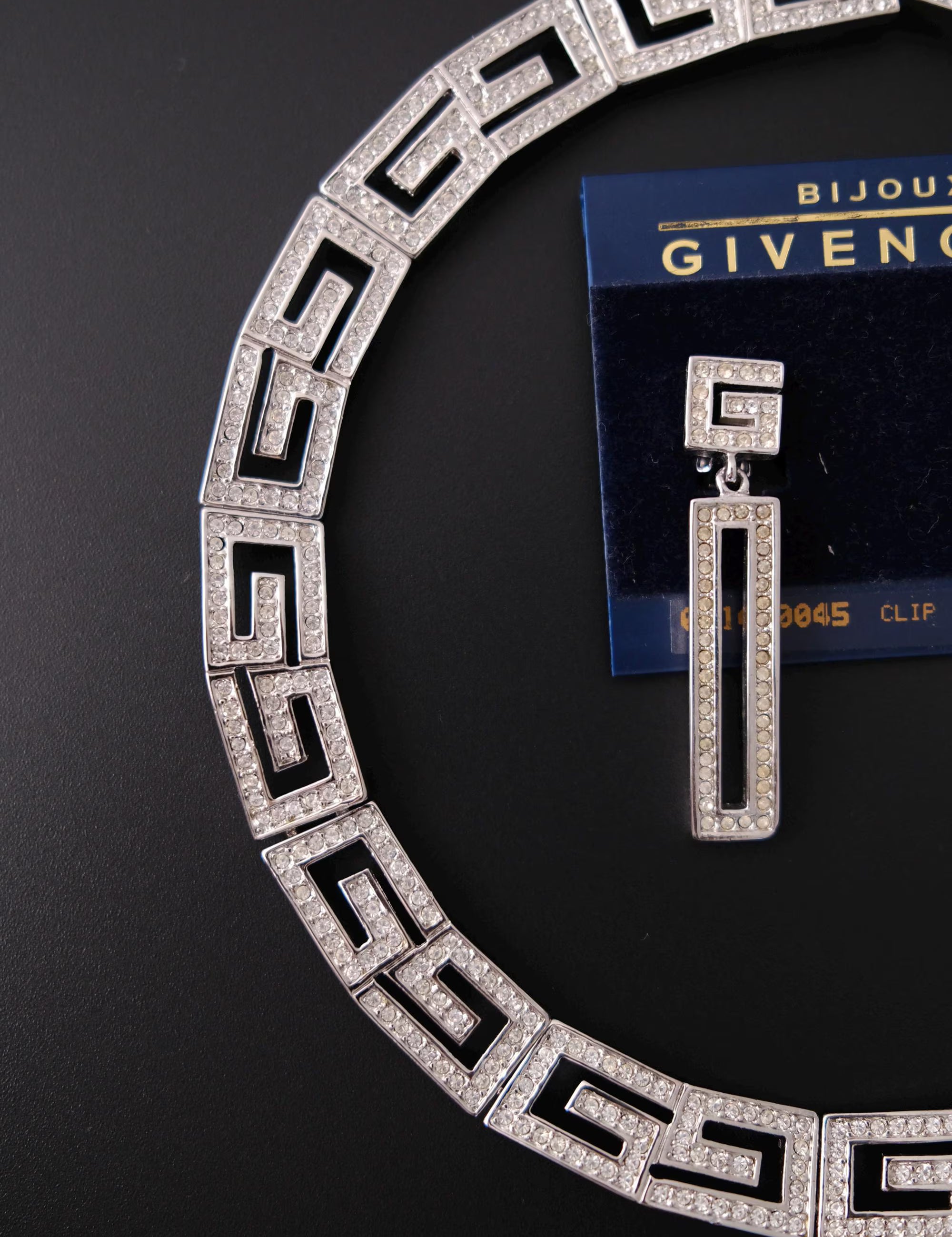 Rare vintage Givenchy crystal G logo choker necklace and matching clip-on earrings set in silver-tone metal