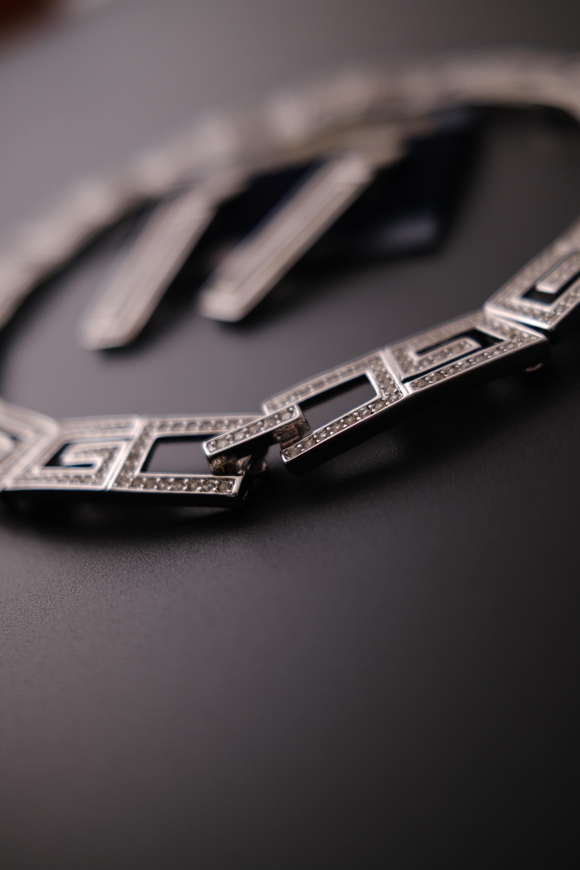 Rare vintage Givenchy crystal G logo choker necklace and matching clip-on earrings set in silver-tone metal