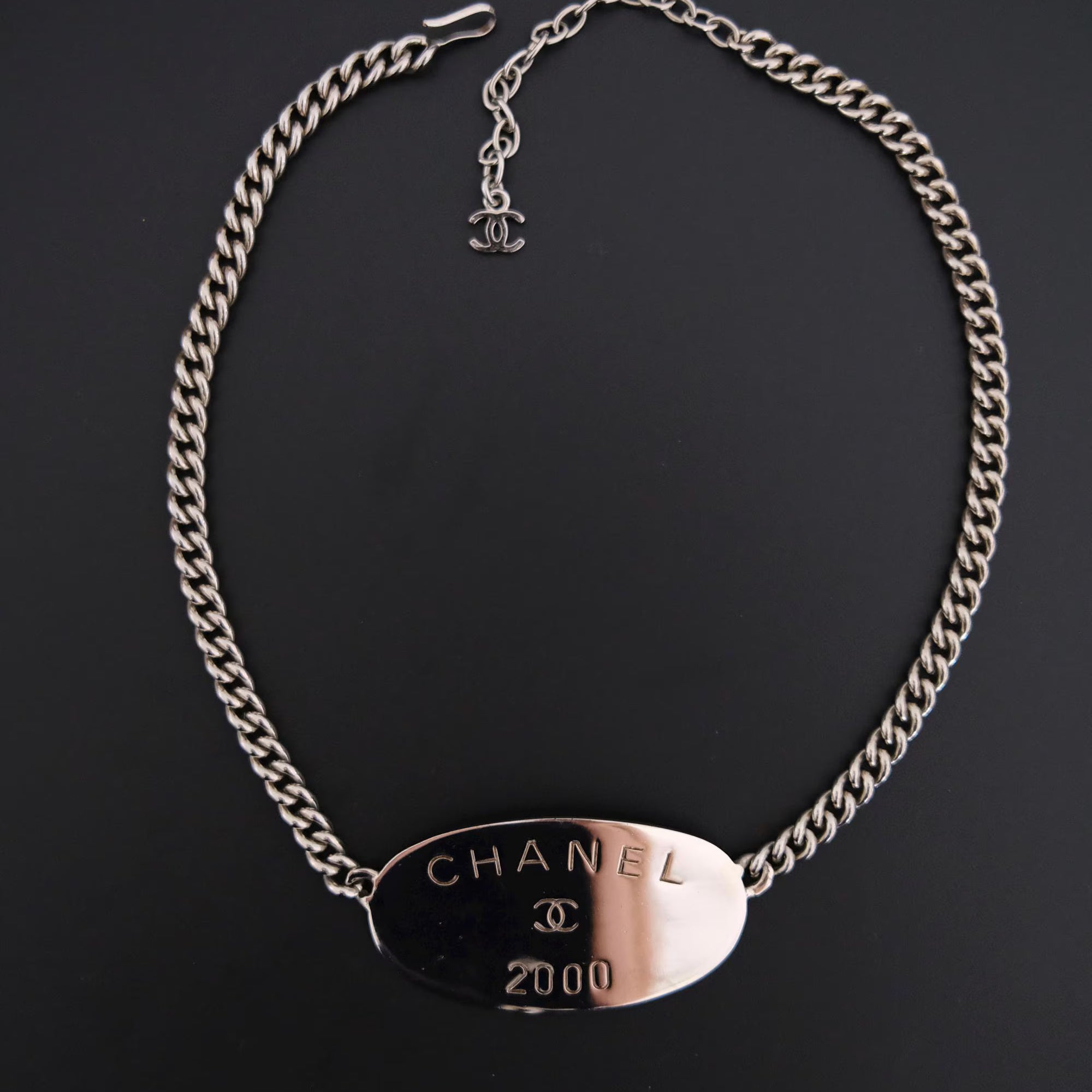 Vintage CHANEL 2000 collection silver-tone plate charm choker necklace with oversized CHANEL centerpiece and iconic CC logo