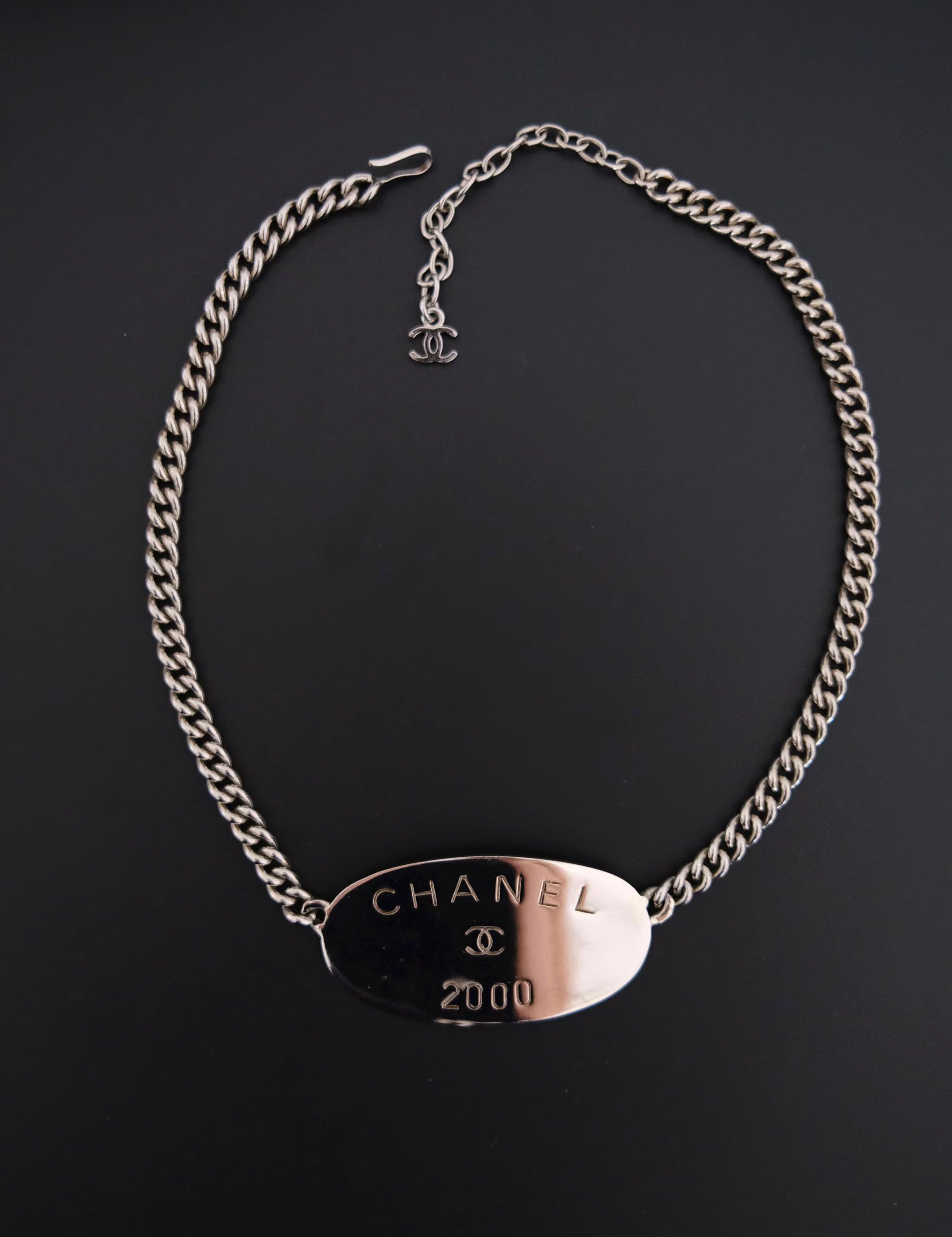 Vintage CHANEL 2000 collection silver-tone plate charm choker necklace with oversized CHANEL centerpiece and iconic CC logo