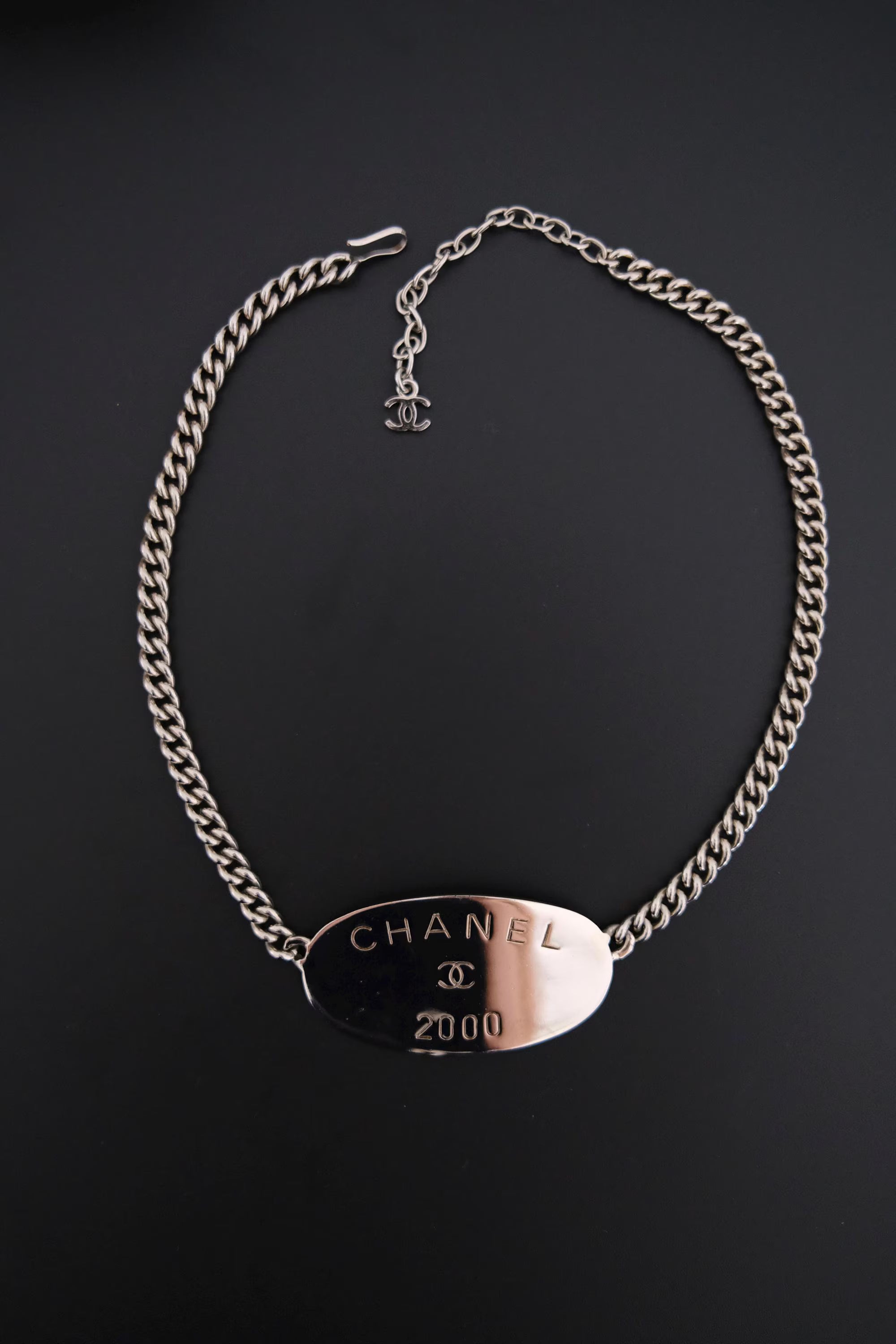 Vintage CHANEL 2000 collection silver-tone plate charm choker necklace with oversized CHANEL centerpiece and iconic CC logo