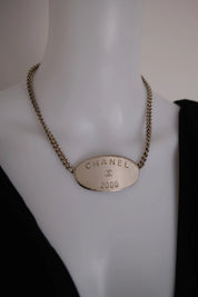 Vintage CHANEL 2000 silver-tone multi-chain choker necklace with oversized CHANEL centerpiece and iconic CC logo